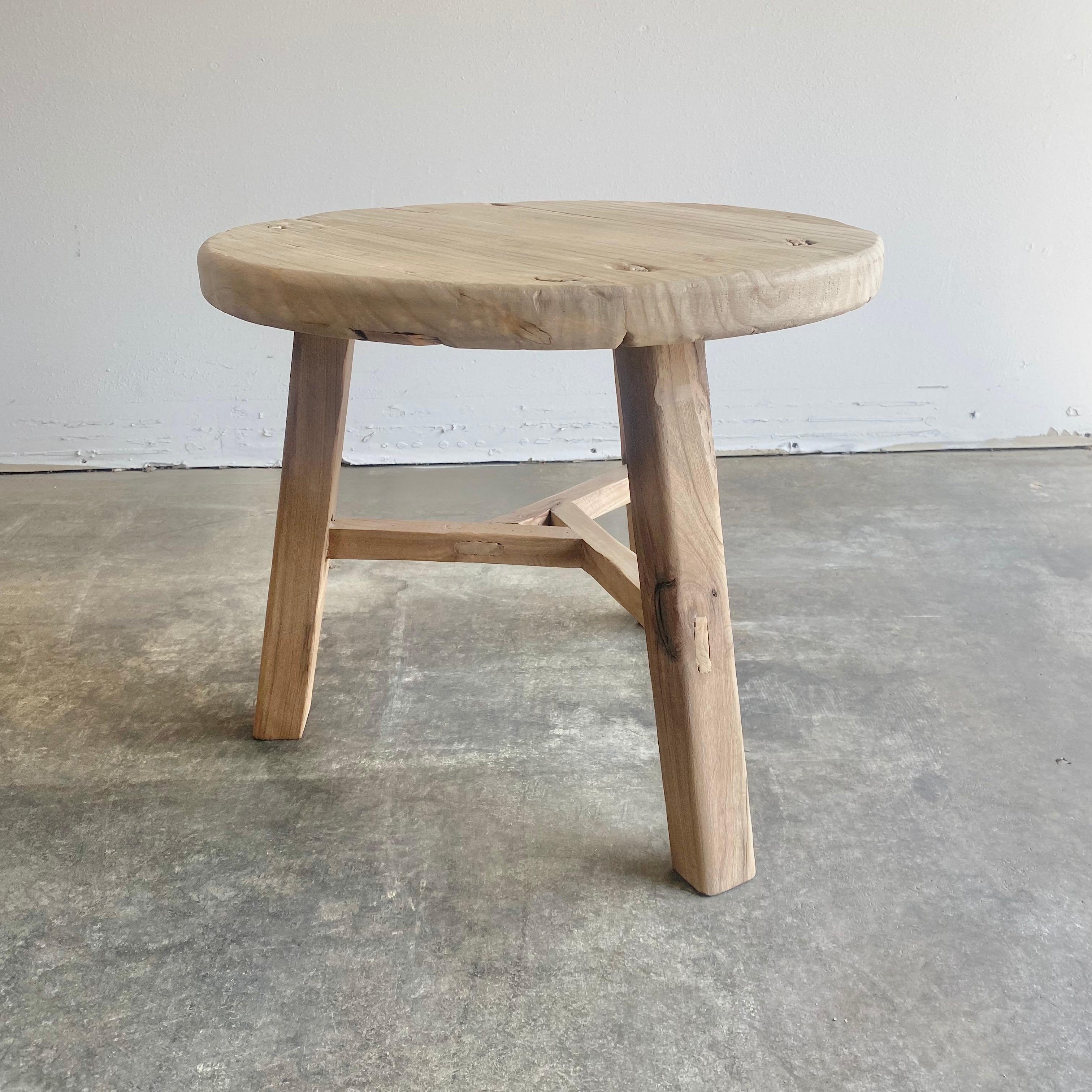 Round natural side table made from reclaimed elmwood Raw natural finish, a warm honey with gray tones in the wood. Solid and sturdy, a great side table for next to a bed, sofa, chairs. Can be stained or painted for a customized look
 Size: 21