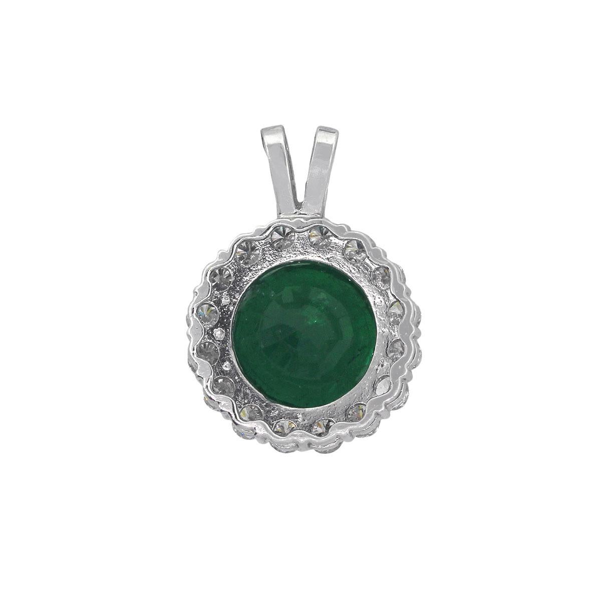 Material: 18k White Gold
Emerald Details: Approx. 10.67ct round cut emerald.
Diamond Details: Approx. 1.74ctw of round brilliant diamonds. Diamonds are G/H in color and SI in clarity.
Pendant Measurements: 0.74″ x 0.45″ x 0.86
Total Weight: 7.5g
