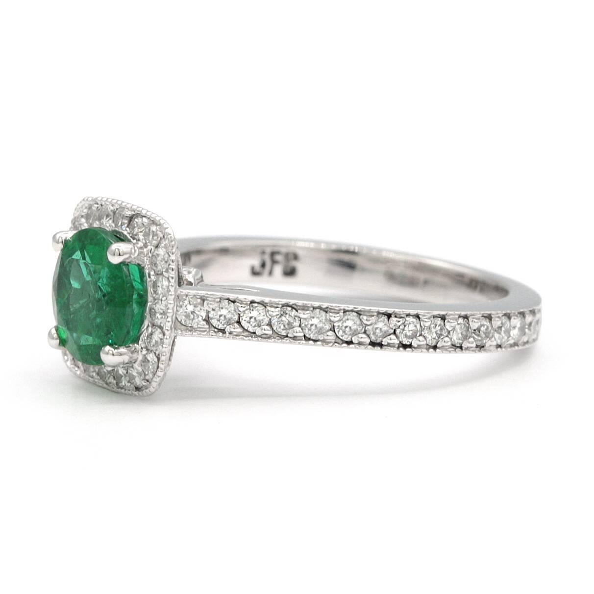 Modern Round Emerald Halo Ring 1.25 Carats AGL Certificate 14 Karat White Gold Ring For Sale