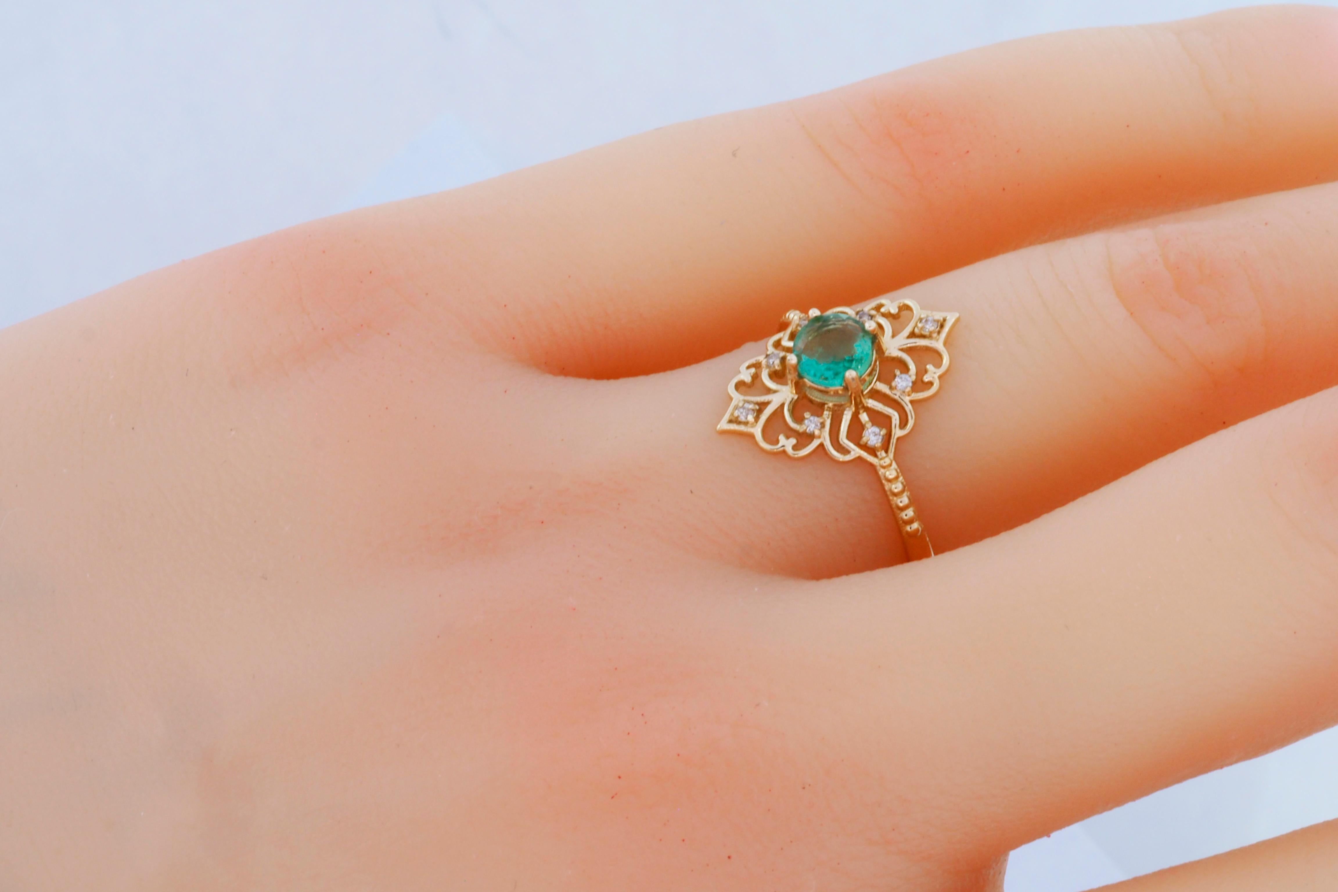 Round emerald ring. 
14k solid gold ring with Emerald and diamonds. Vintage emerald ring. Emerald engagement ring. May Birthstone Ring.

Metal: 14k gold
Weight: 1.6 g. depends from size.

Set with emerald, color - bluish green
Round cut, 0.50 ct. in