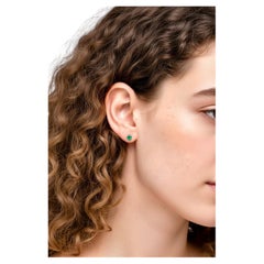 Boucles d'oreilles à clous avec émeraudes rondes en or blanc 18 carats, 0,30 carat