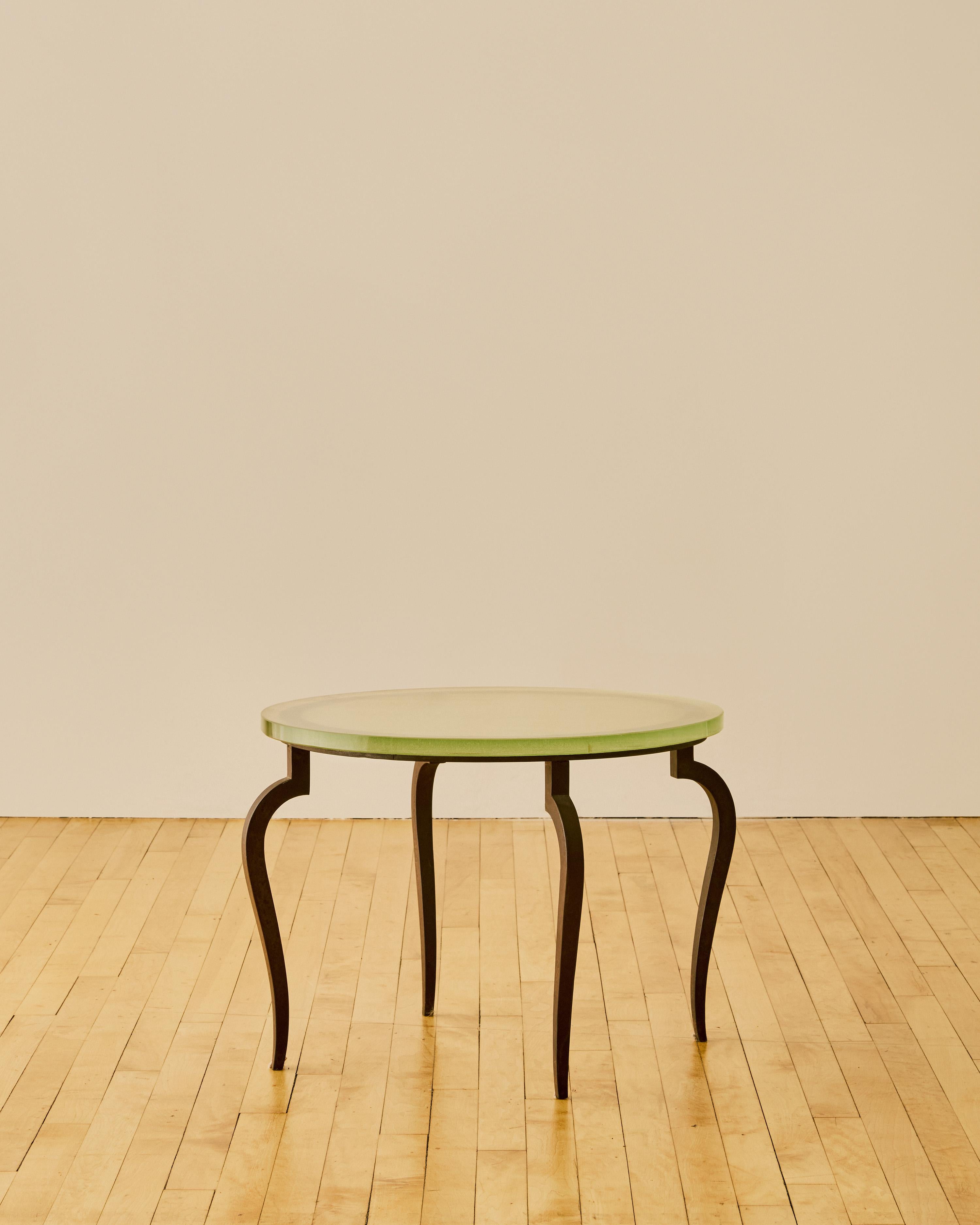 Round French coffee or end table with a Saint Gobain textured glass top and iron legs c. 1960.