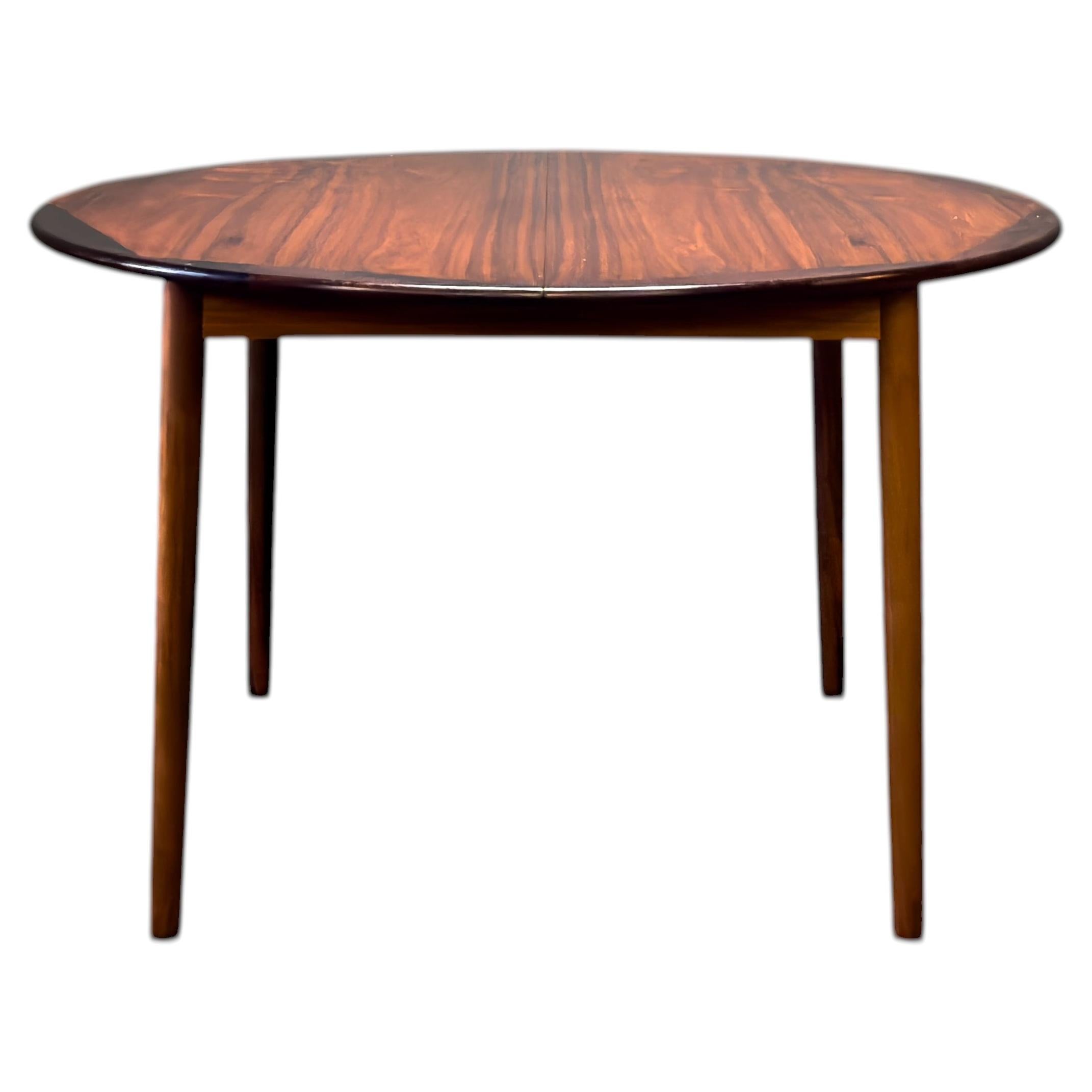 Round Extendable Dining Table