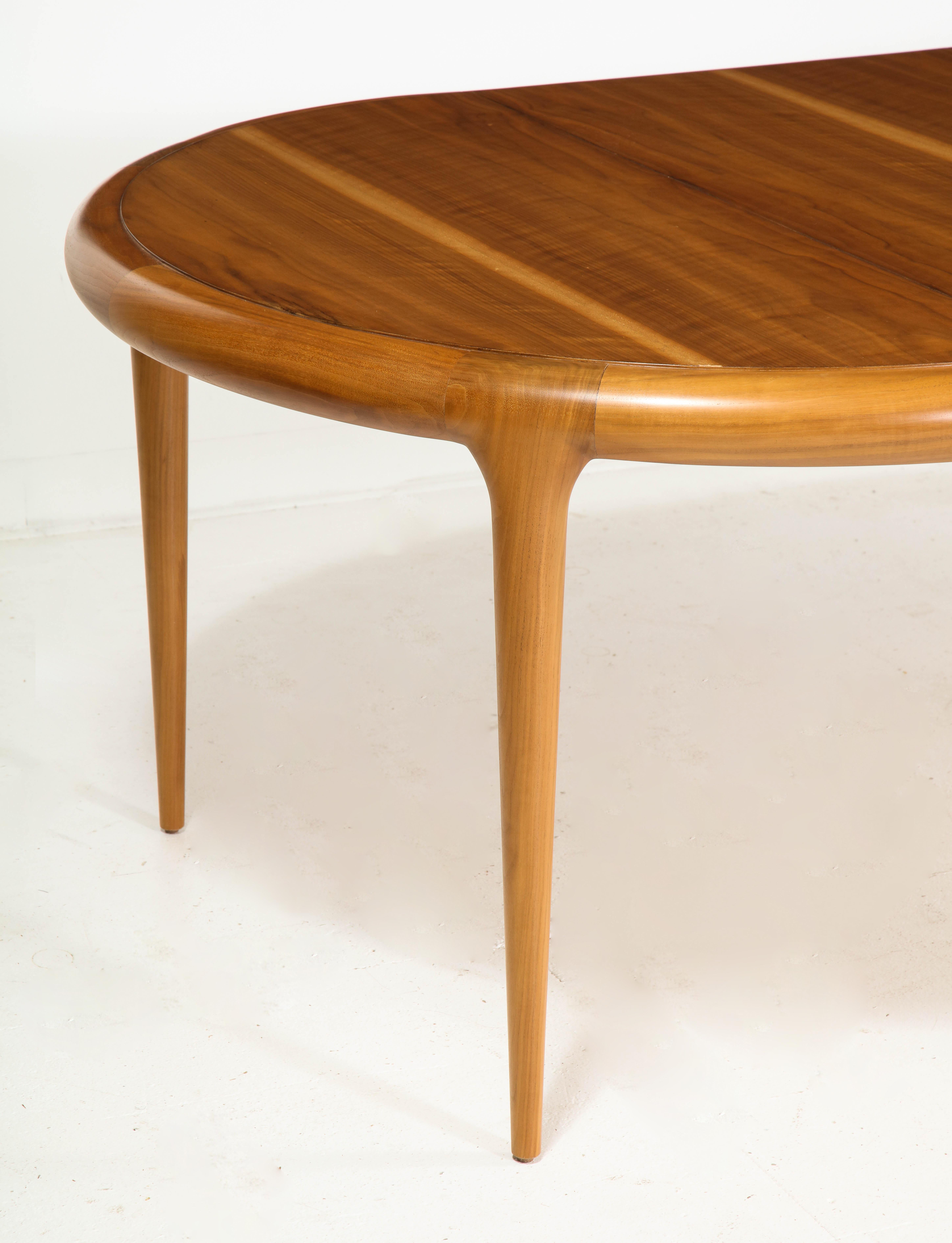Modern Round Extension Dining Table in Wood Offered by Vladimir Kagan Design Group