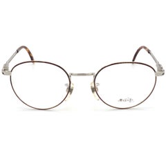 Round eyeglasses frame by Sting, Italy 90s