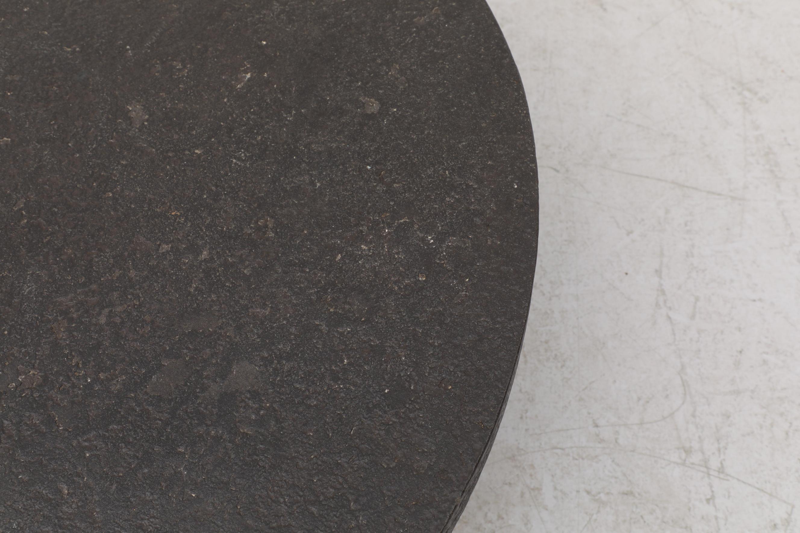 Round Faux Lava Stone Coffee Table with Arched Base 4