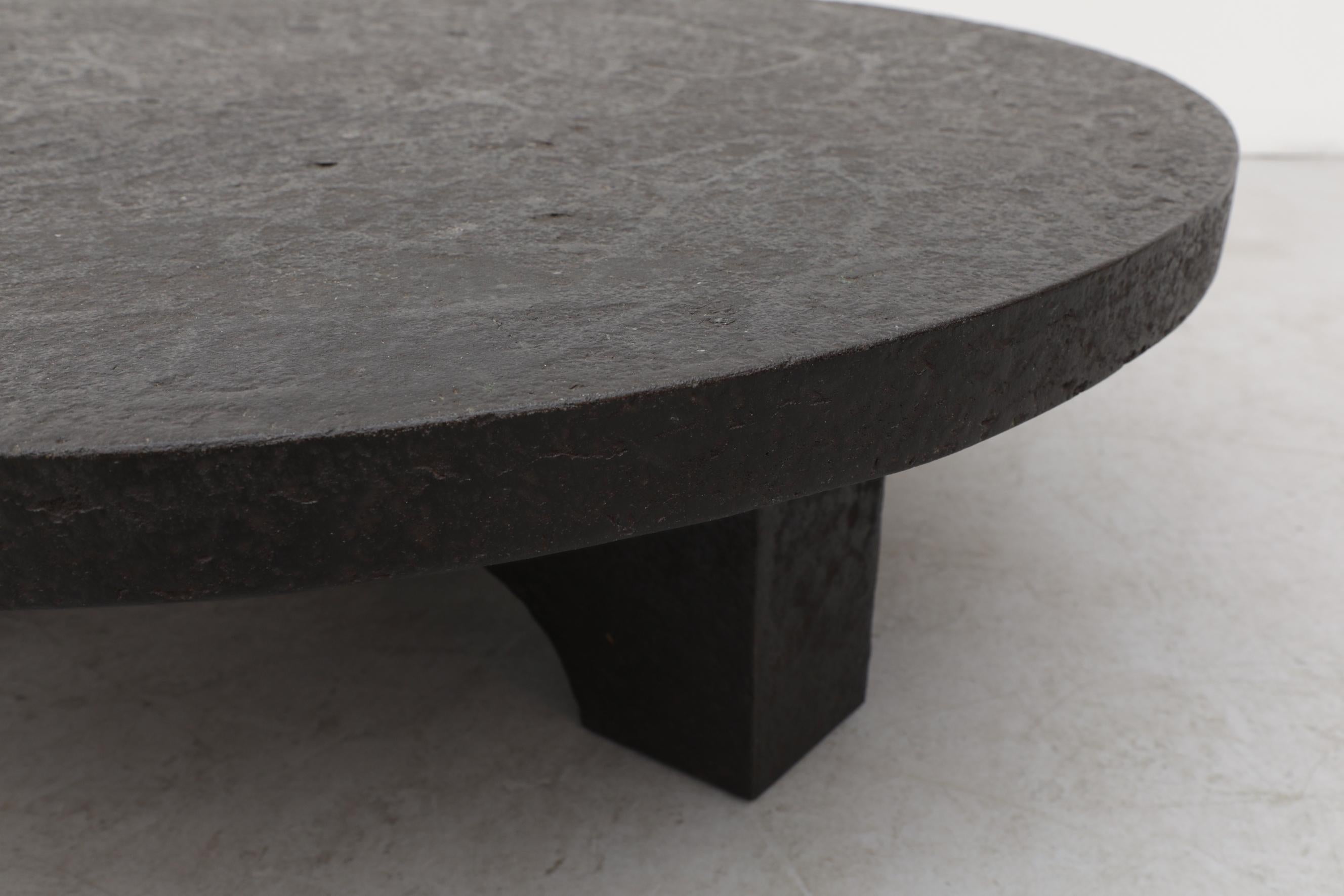 Round Faux Lava Stone Coffee Table with Arched Base 5