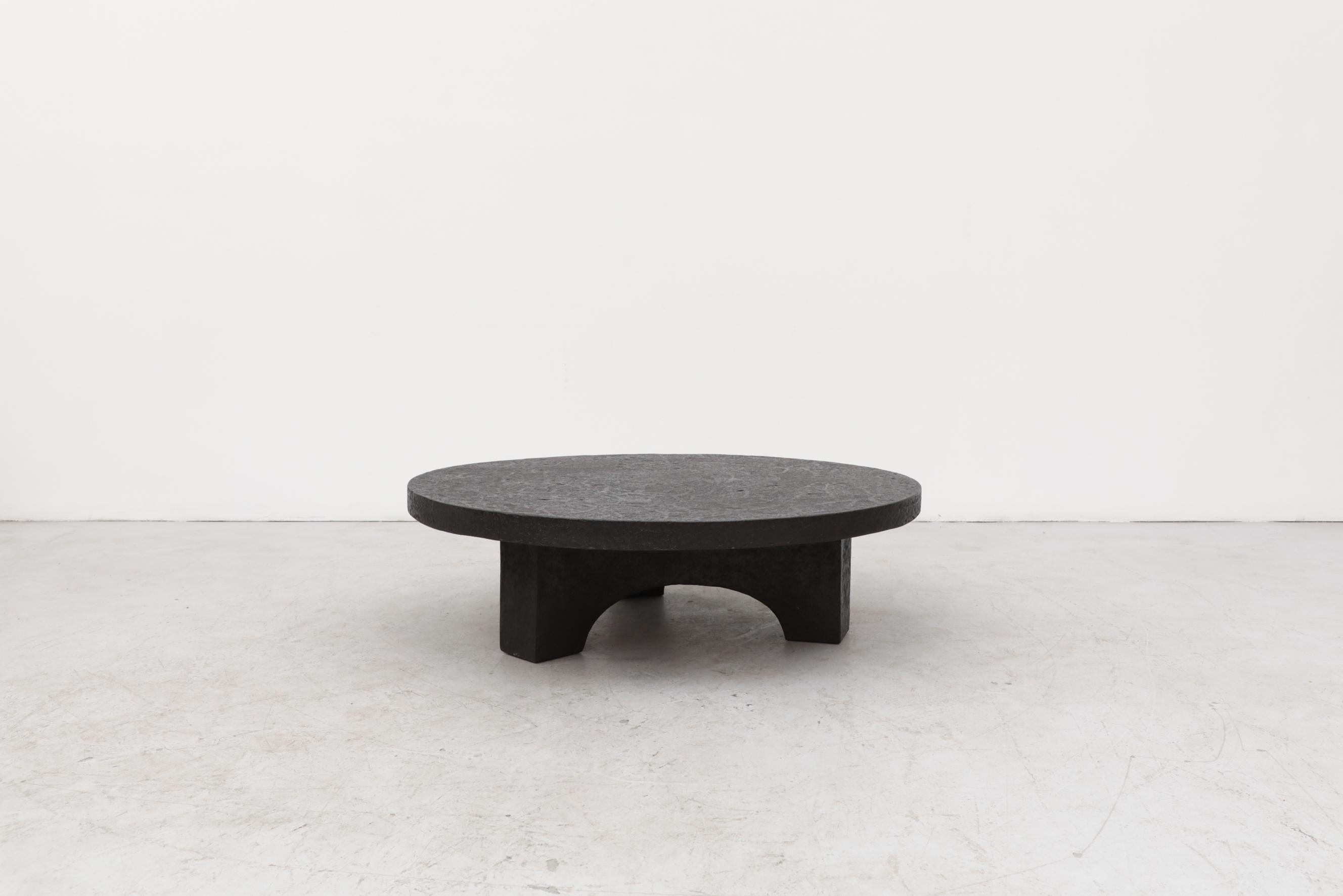 Mid-Century Modern Round Faux Lava Stone Coffee Table with Arched Base