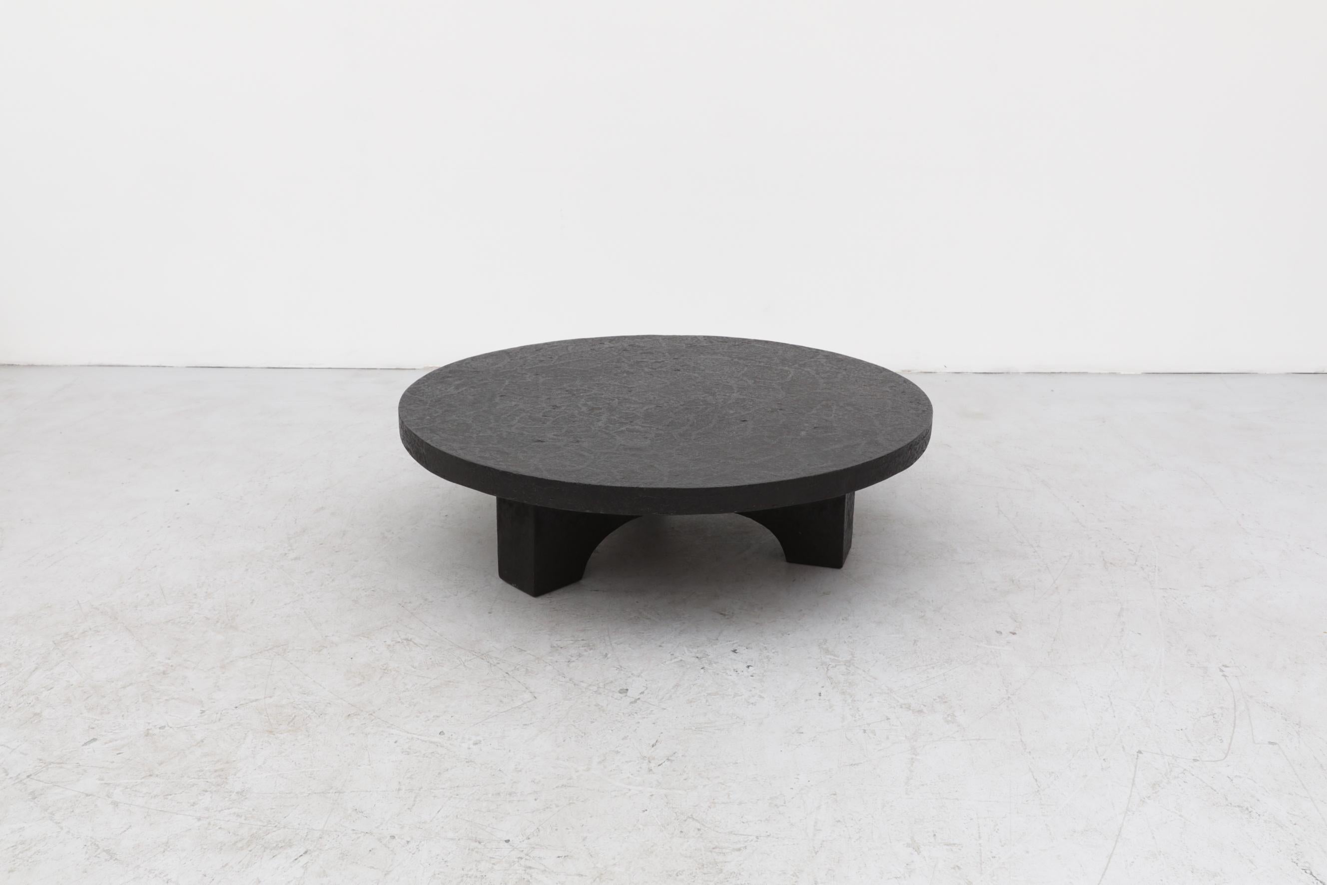 Dutch Round Faux Lava Stone Coffee Table with Arched Base