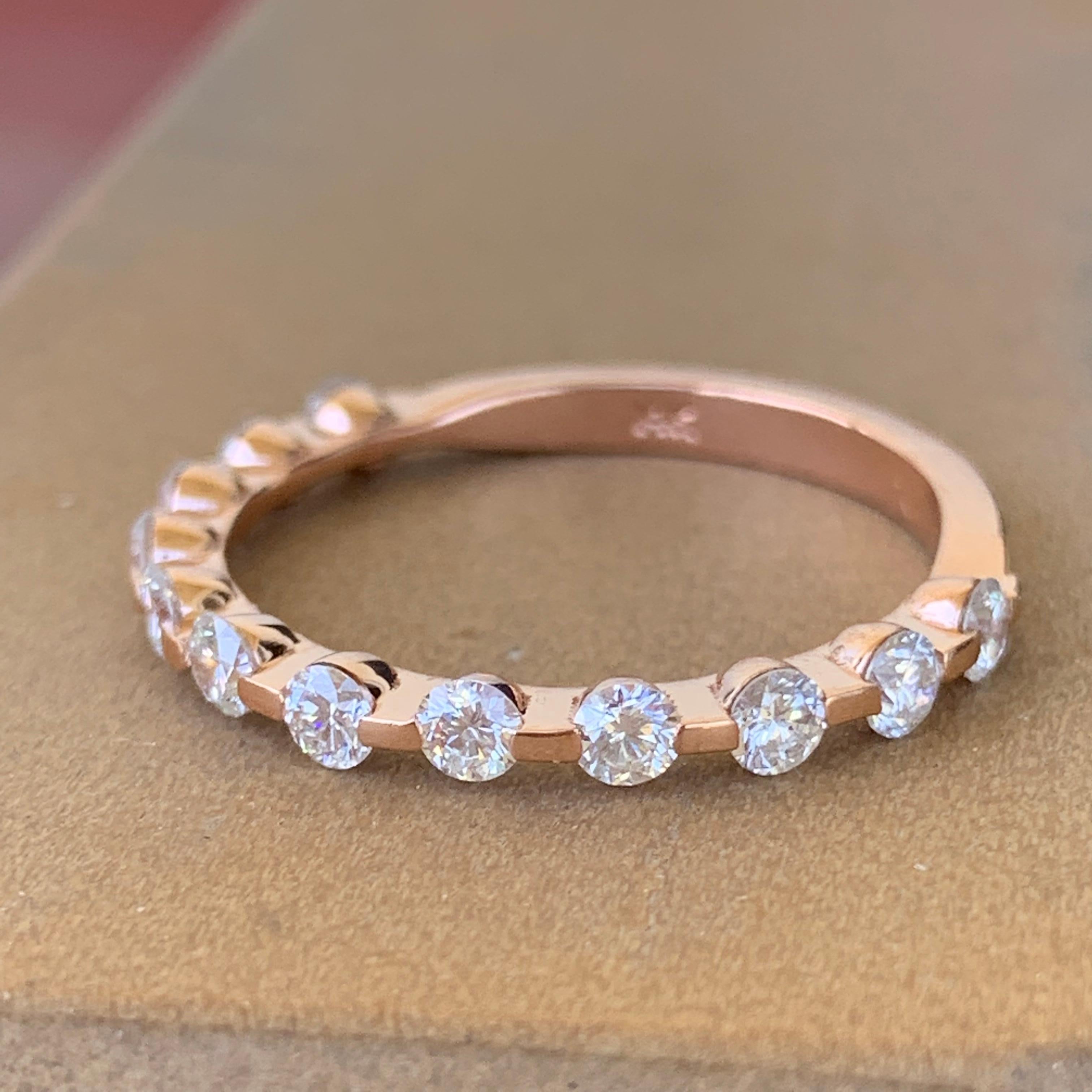 Made to order, please allow 2-5 weeks.
 
Round Set Diamond Wedding / Half Eternity Band 0.9 CTW F-H Color VS - SI Clarity

12 Perfectly Set Diamonds 2.5 mm each
White natural diamonds no treatment (F-H Color VS-SI Clarity)
Solid 14k Rpse Gold

Can