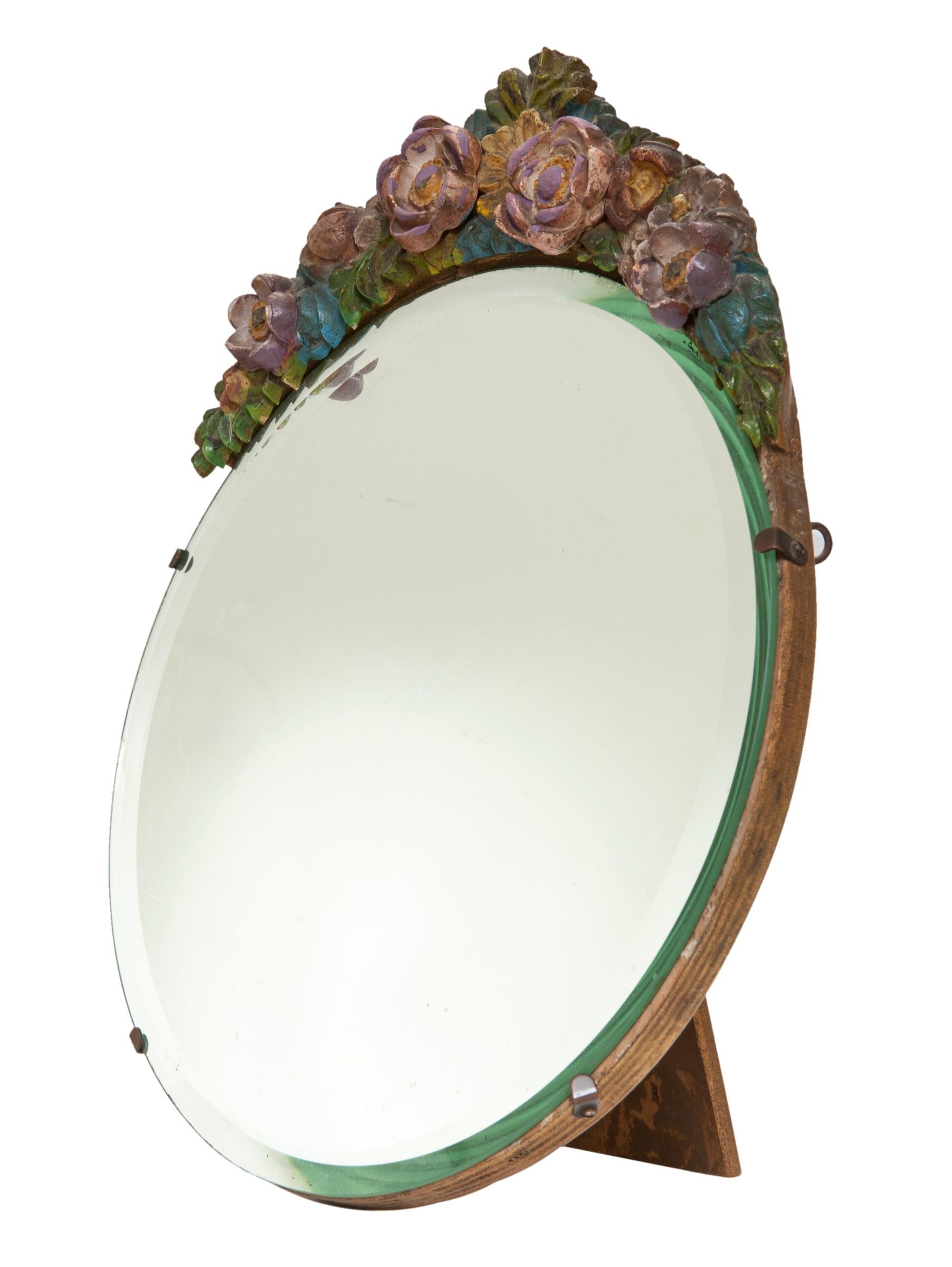 1930s Easel Table Mirror with muted floral crown.
Original Barbola Easel Mirror with narrow bevel & heavy hardwood frame. The painted finish is original, painted in the colors of Autumn.