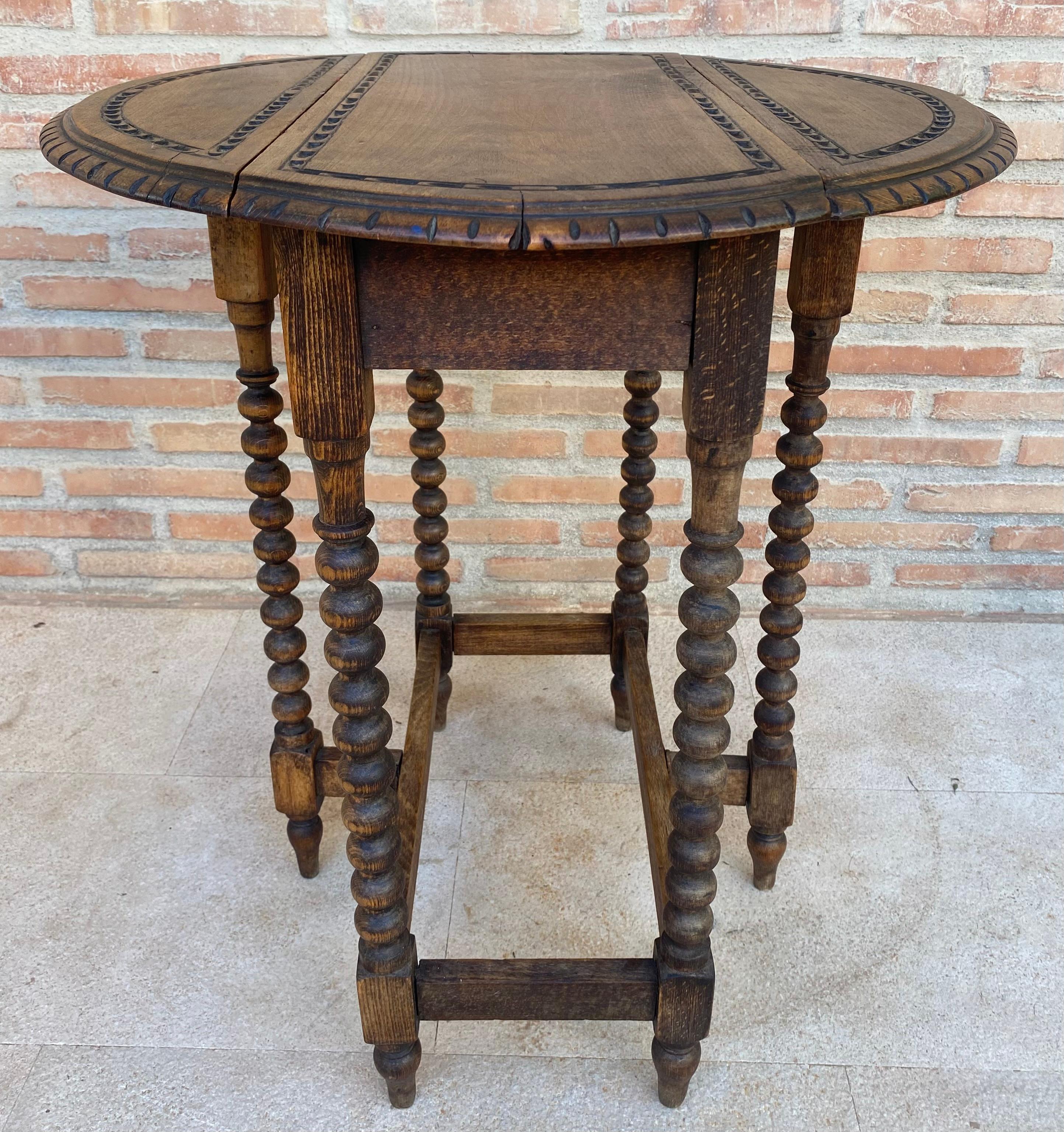 Walnut Round Folding Center Oak Table with Carved Top and Solomonic Legs, 1940s