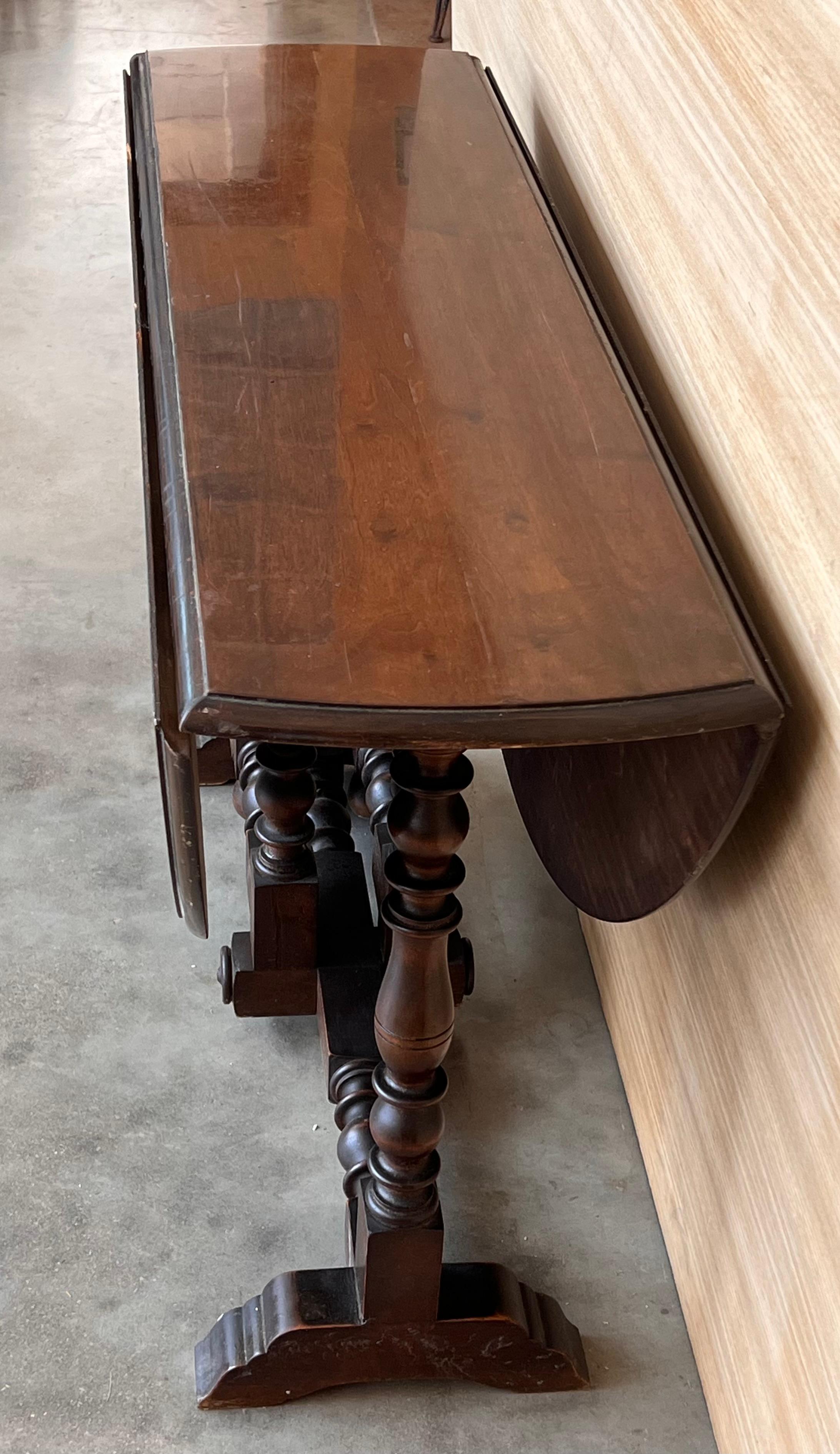 20th Century Round Folding Dining Table with Beveled Top and Carved Legs, 1940s For Sale