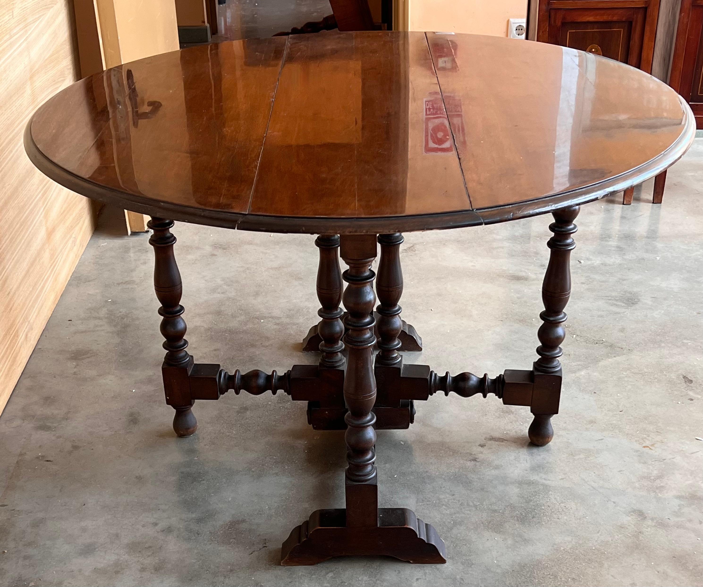 Walnut Round Folding Dining Table with Beveled Top and Carved Legs, 1940s For Sale