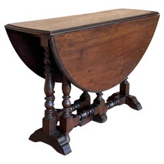 Round Folding Dining Table with Beveled Top and Carved Legs, 1940s