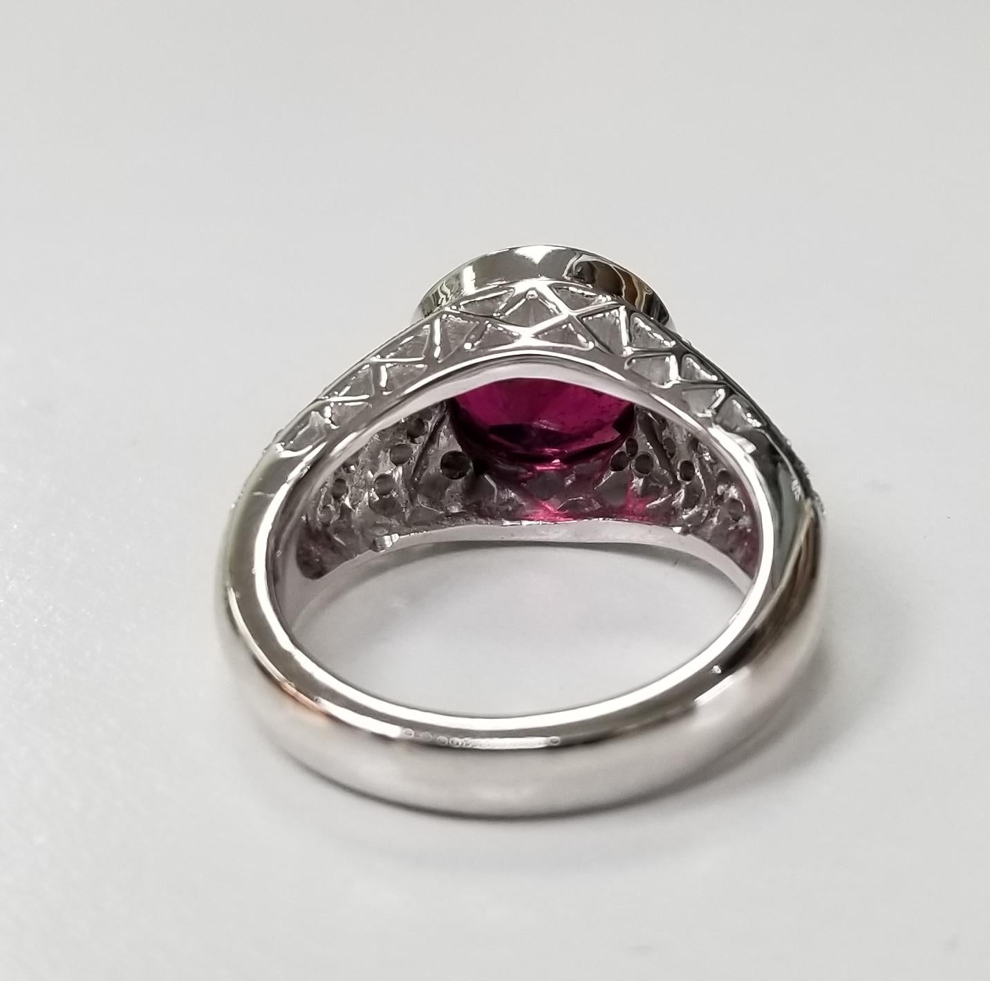Round Cut Round Garnet and Diamond Ring For Sale