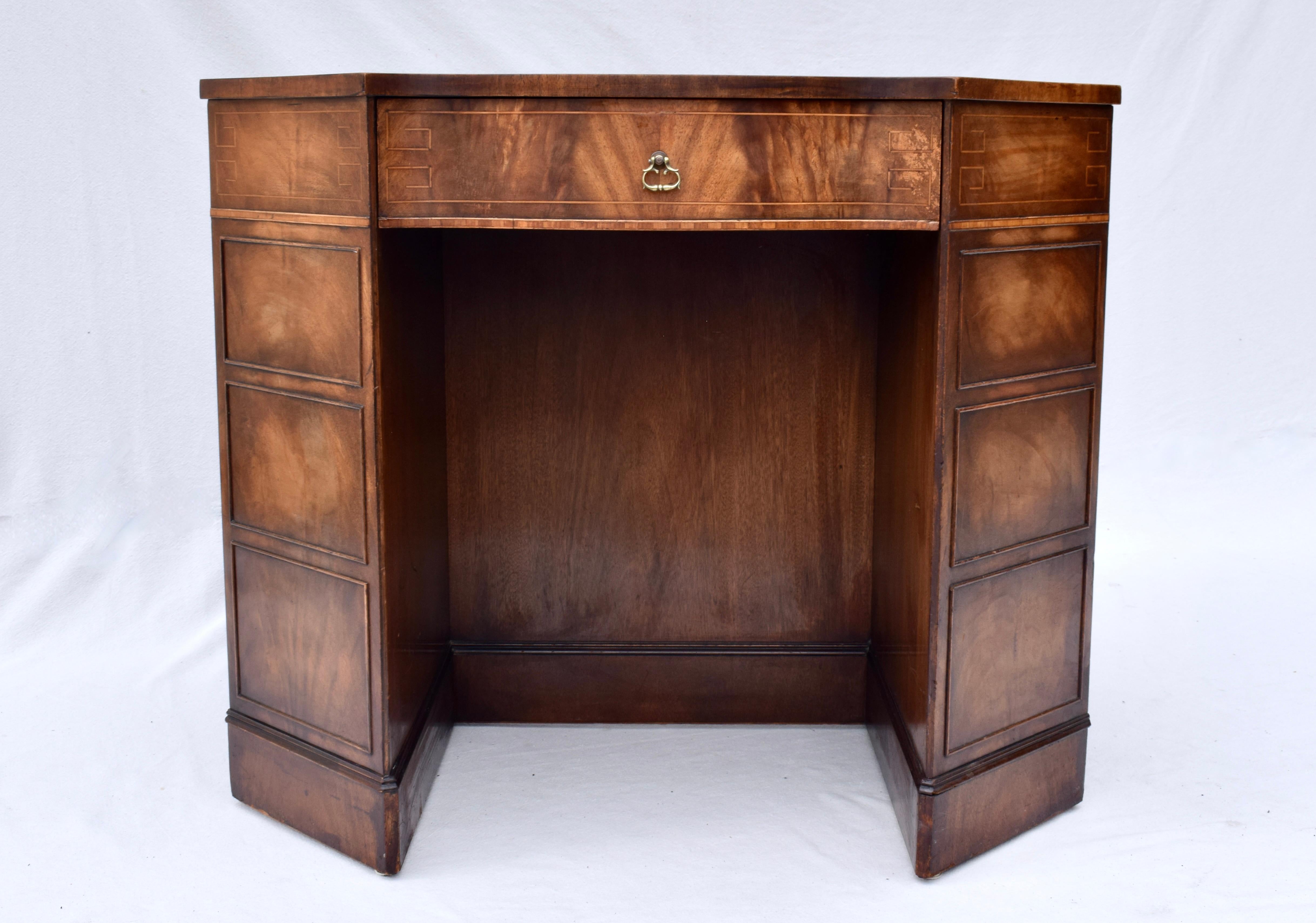 Unusual book matched flame Mahogany partners desk with tooled leather top & inlay details throughout in the Gerogian style. Generous sized dovetailed drawers flank each partners side. Consistent with its' unique nature the desk boasts aesthetically