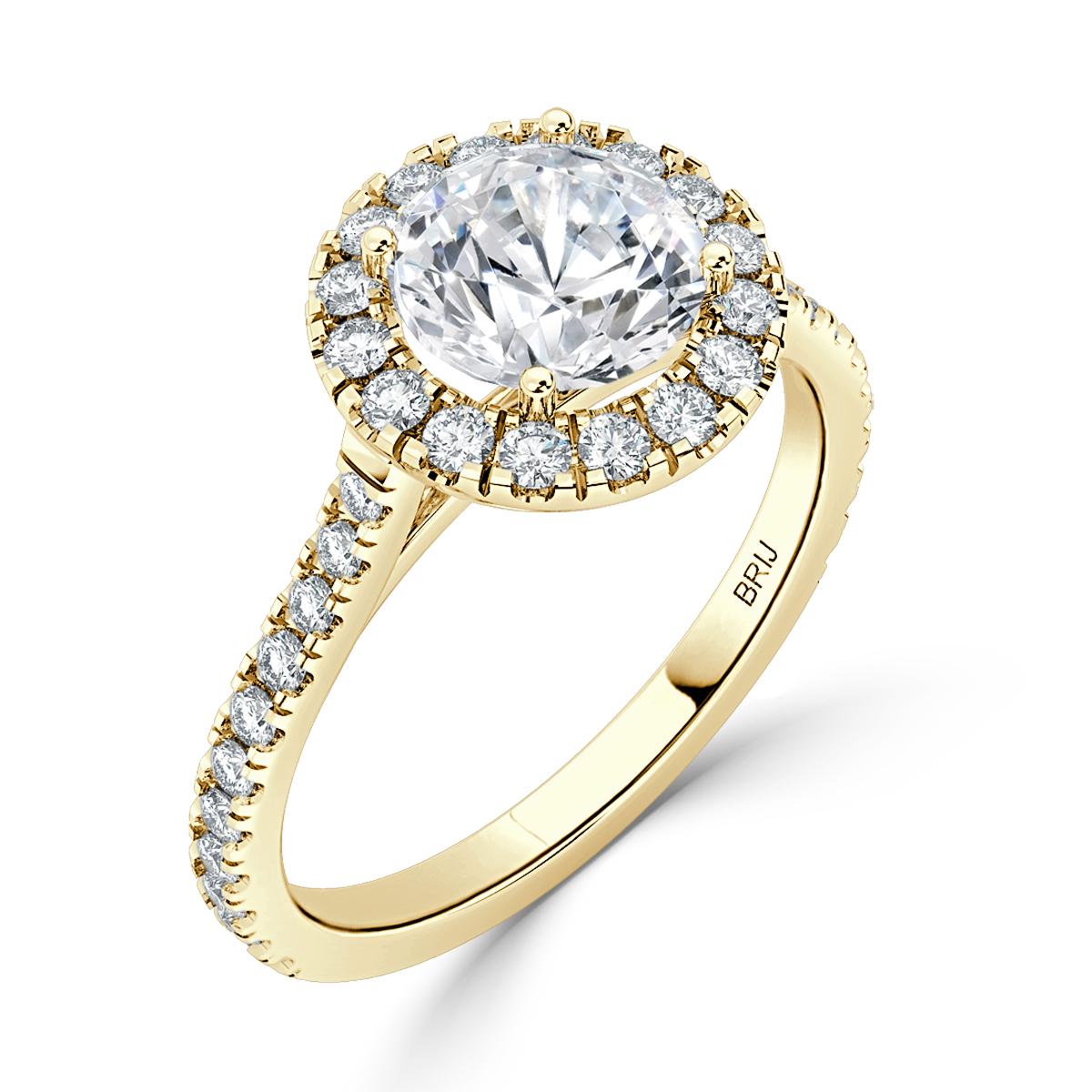 Simple, classic Diamond Halo engagement ring. Accented with 34 full cut diamonds along the shank  and Halo in a 18k Yellow Gold setting. 
GIA certified round center stone 0.60 CT
Total Carat weight above 1.00 CT

GIA Certified Diamond