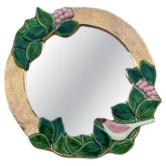 Round gilt and glazed ceramic mirror by Mithé Espelt, circa 1970
