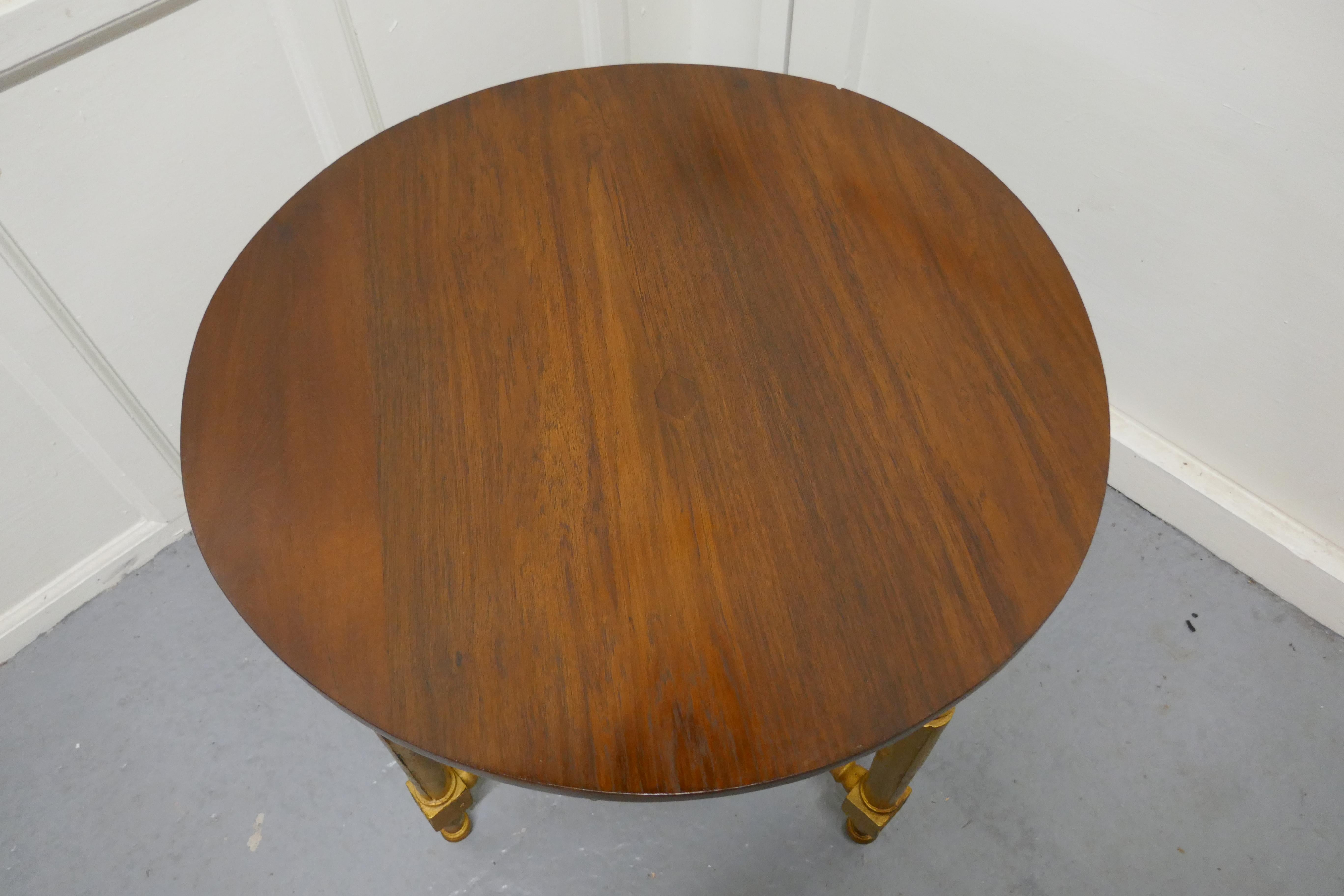 Round gilt occasional table

This useful little table is set on attractive turned gilt legs with a carved apron, the round tabletop is 1” thick polished mahogany, this has been cleaned back to the wood and waxed

This is a very attractive piece,