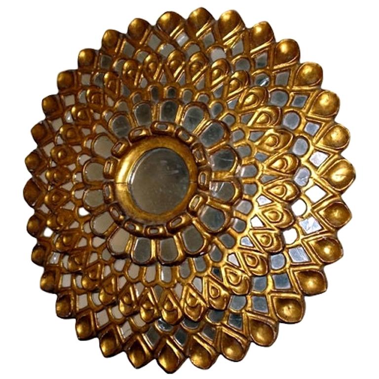 Miroir rond en bois doré