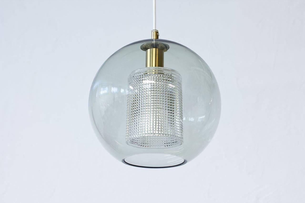 Scandinavian Modern Round Glass and Brass Pendant Lamp by Carl Fagerlund for Orrefors, Sweden, 1960s