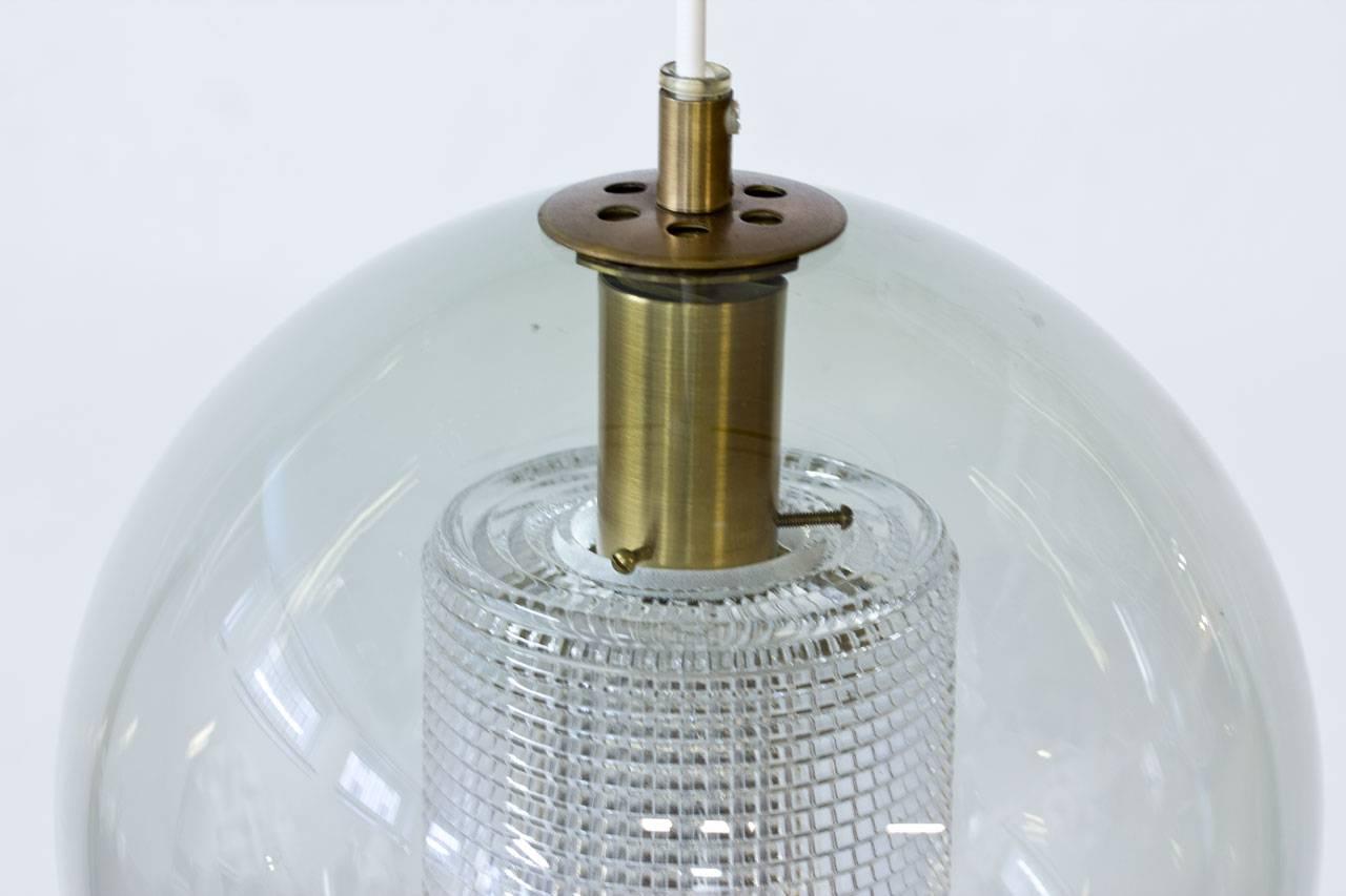 Round Glass and Brass Pendant Lamp by Carl Fagerlund for Orrefors, Sweden, 1960s In Excellent Condition In Stockholm, SE