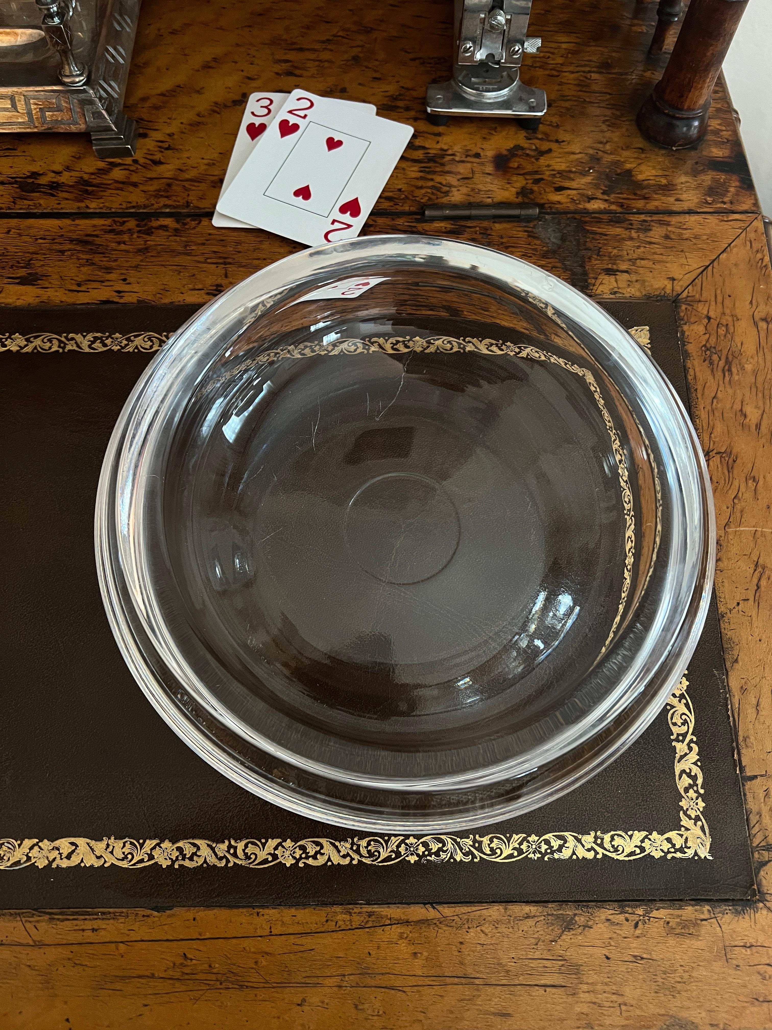 A large and very versatile glass bowl, dish, or ashtray.   The piece is very thick and heavy and has a wonderful look.

Perfect for serving candy or use as a cigar ashtray.  A compliment to any cocktail table, bar or use on the dining table as