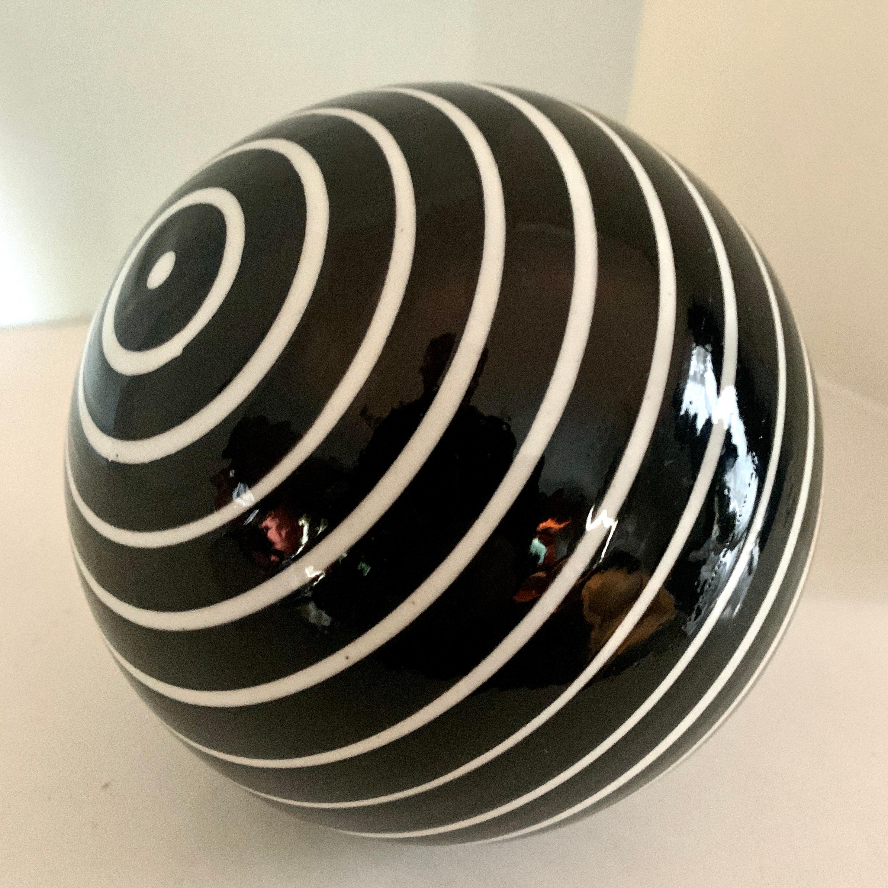 20th Century Round Glass Sphere Paper Weight with White Stripes on a Black Field