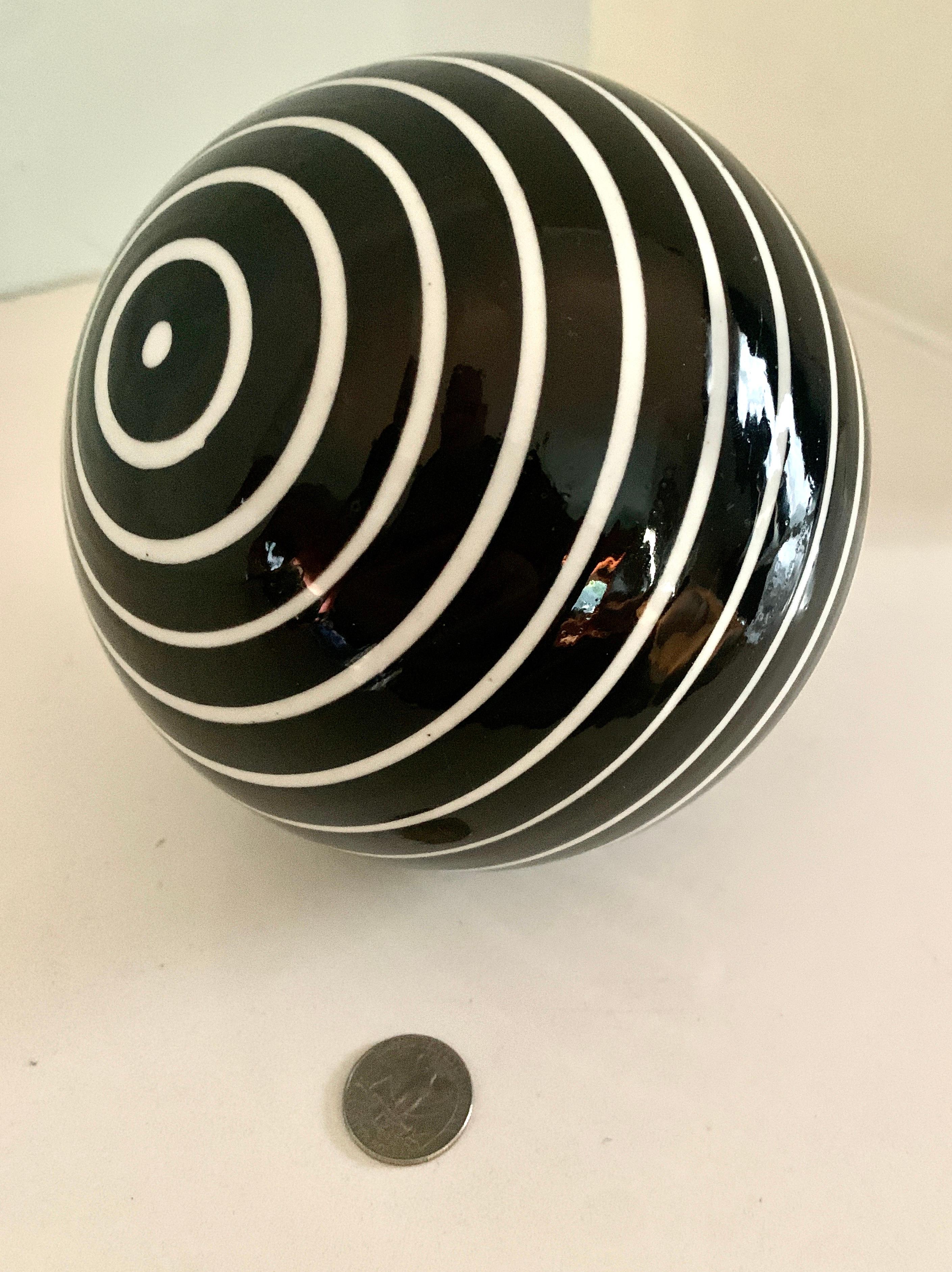 Art Glass Round Glass Sphere Paper Weight with White Stripes on a Black Field