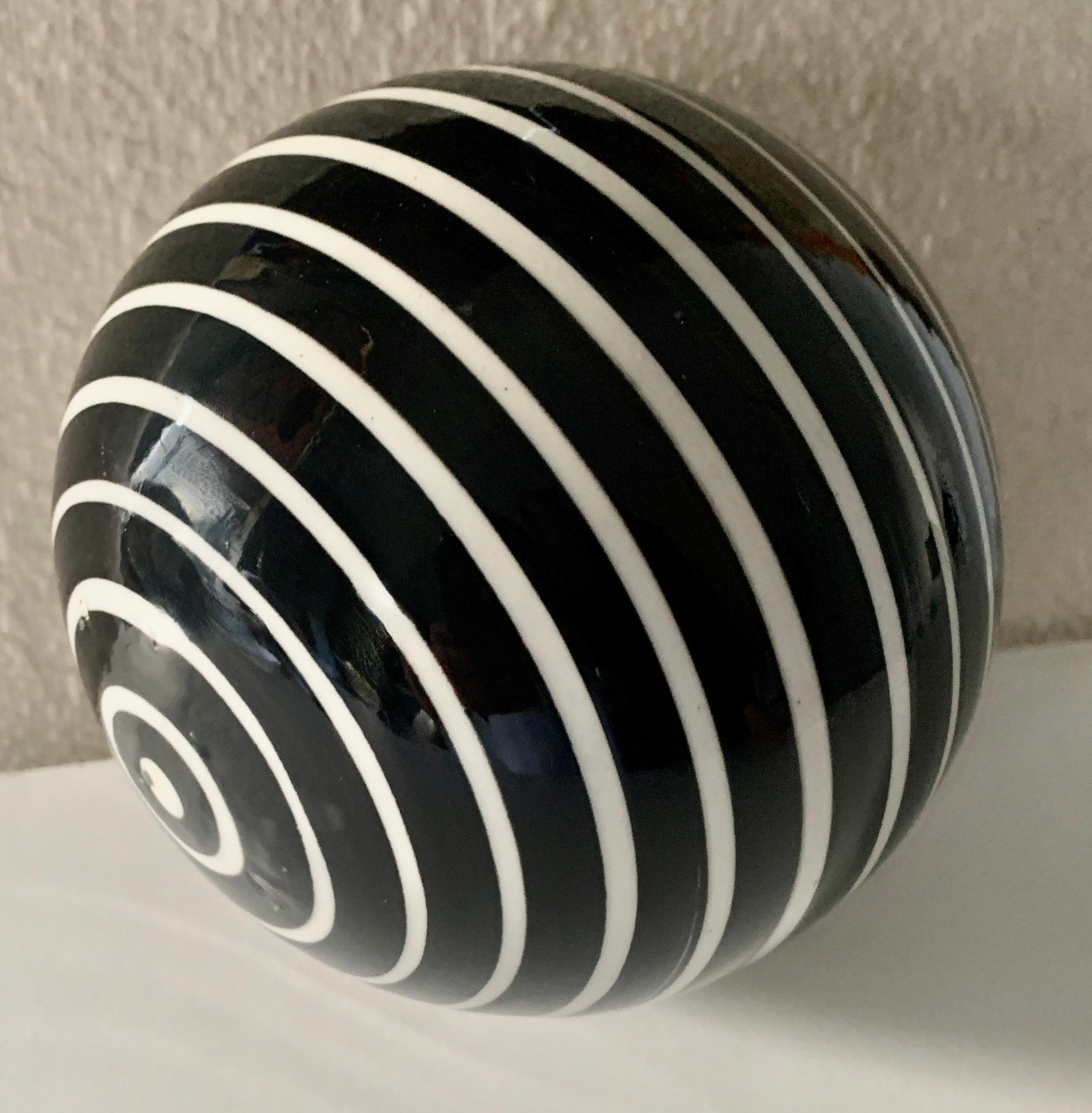 Round Glass Sphere Paper Weight with White Stripes on a Black Field 3