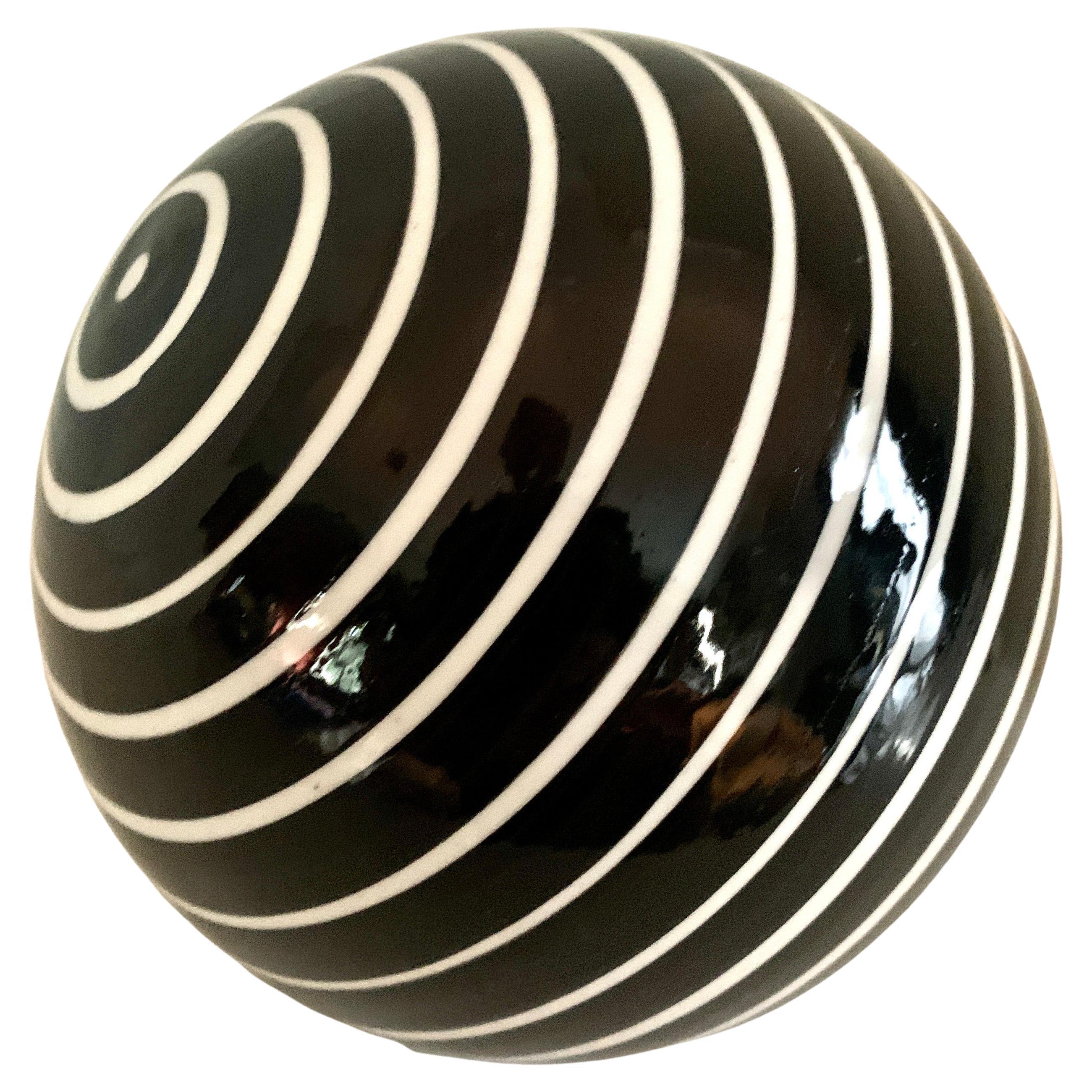 Round Glass Sphere Paper Weight with White Stripes on a Black Field