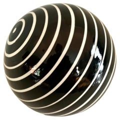 Round Glass Sphere Paper Weight with White Stripes on a Black Field