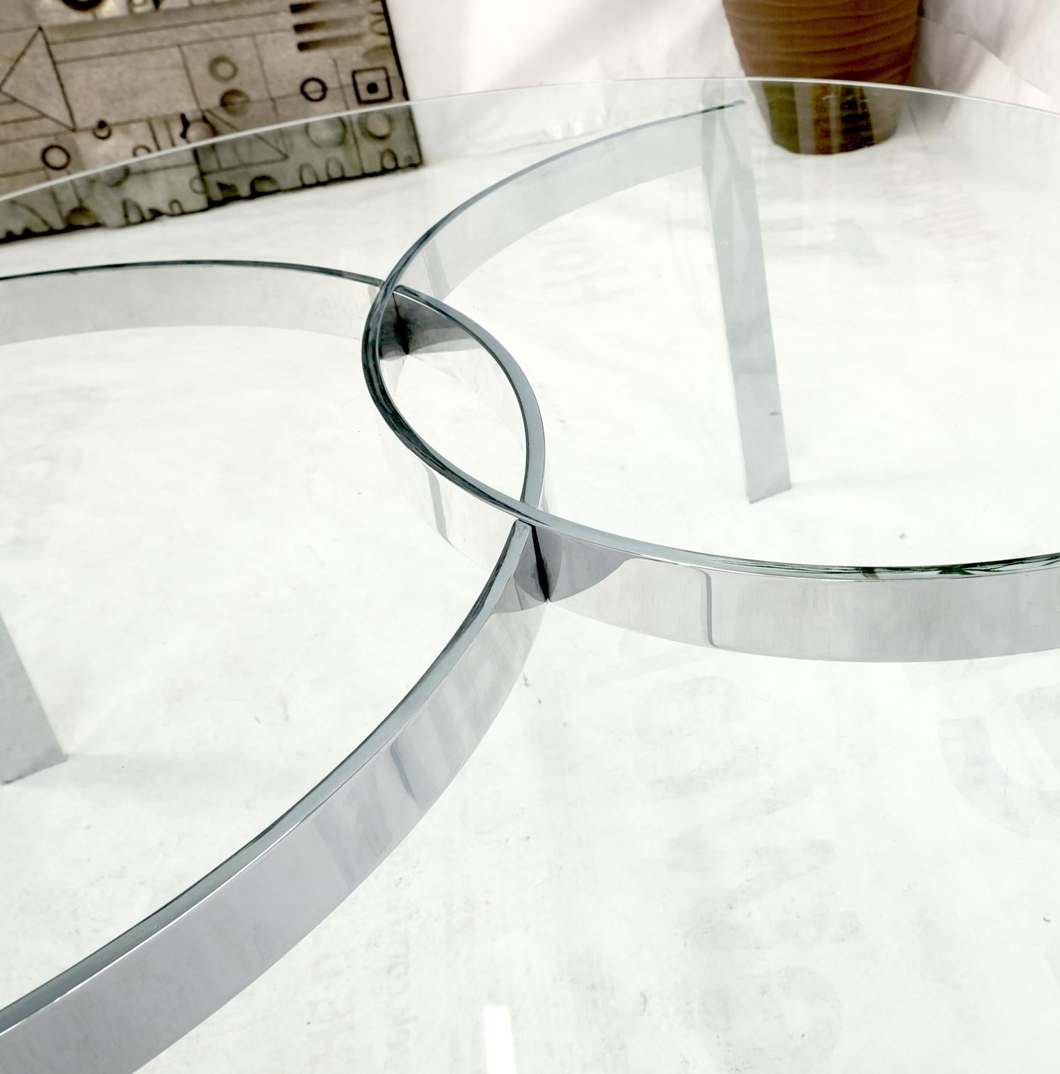 Round Glass Top Crome Interlocking Half Circle Shape Figures Base Coffee Table For Sale 1