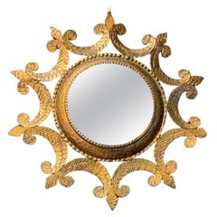 Miroir rond à cadre courbé doré, Espagne, années 1950