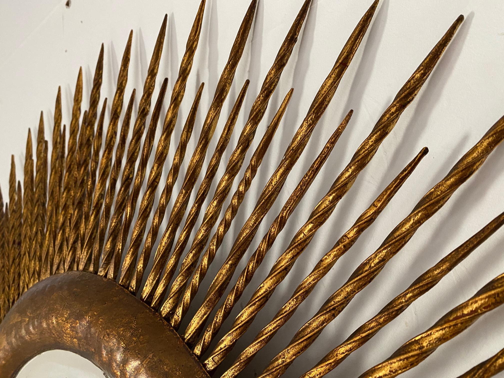 1960s Spanish round gold gilt metal starburst mirror.
Very decorative.
Original mirror
