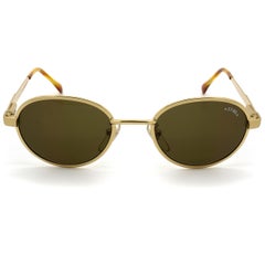 Gafas de sol redondas de oro de Sting, Italia