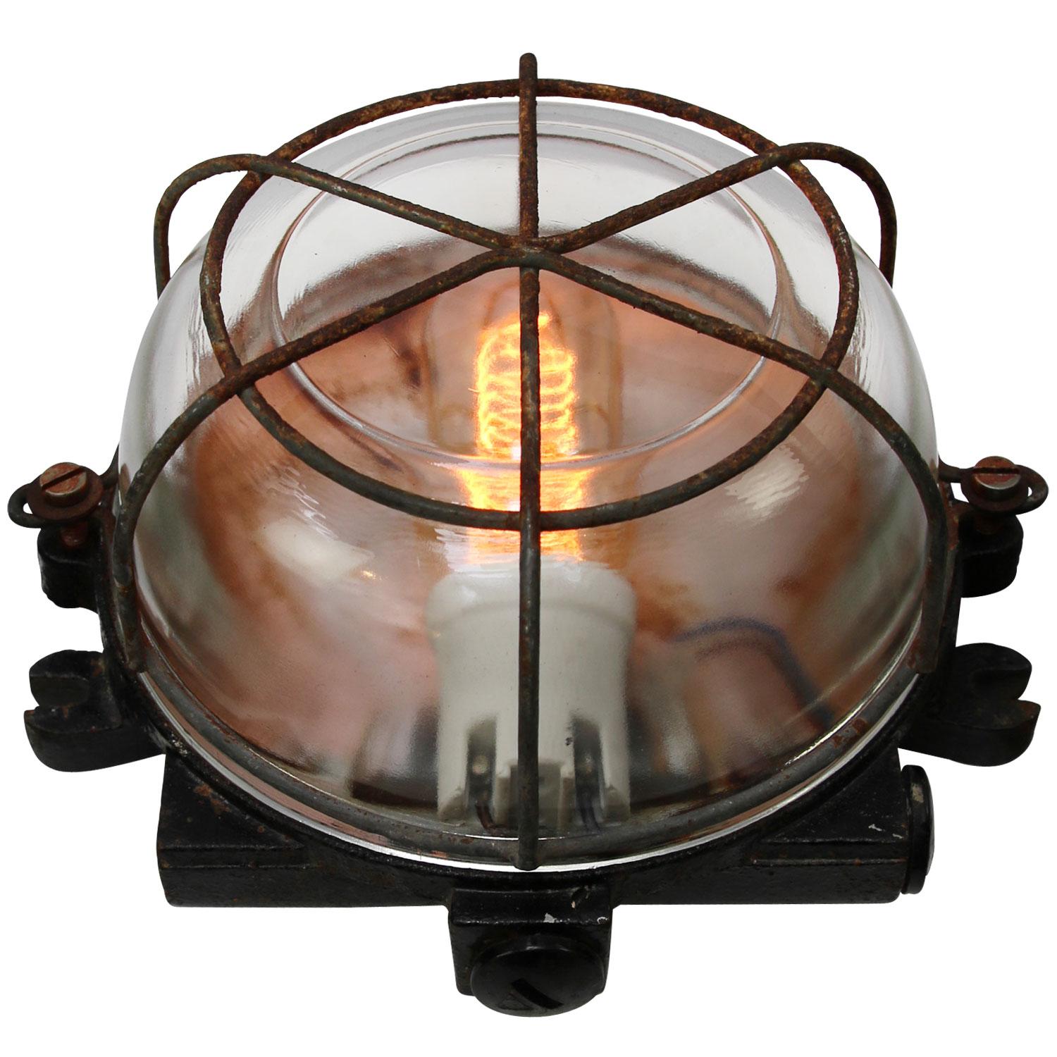 Industrial wall and ceiling scone. Grey cast iron.
Clear glass. 

Weight: 2.20 kg / 4.9 lb

Priced per individual item. All lamps have been made suitable by international standards for incandescent light bulbs, energy-efficient and LED bulbs.