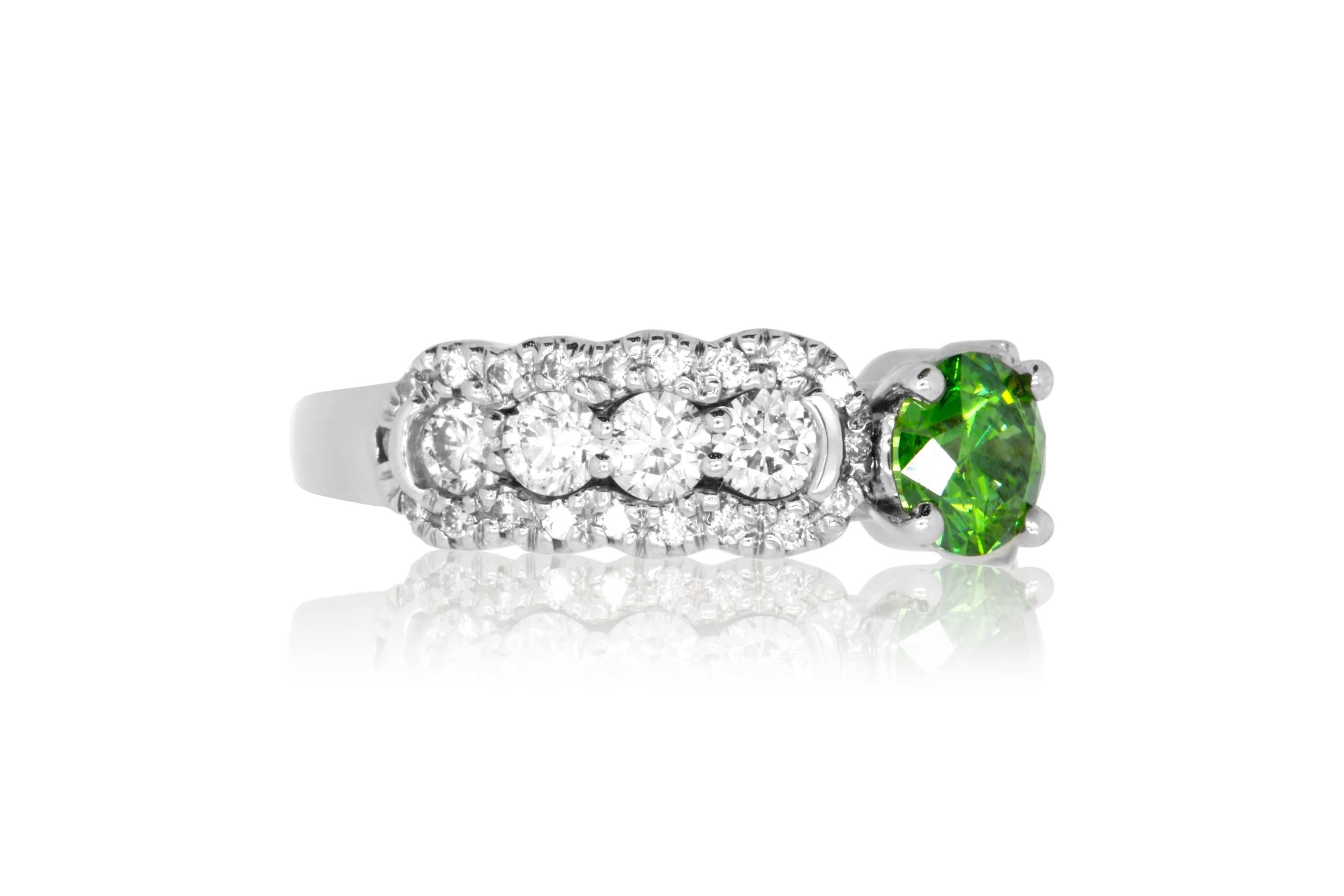 Material: 14k White Gold 
Center Stone Details: 0.85 Carat Round Green Diamond measuring 6mm
Diamond Details: 48 Brilliant White Diamonds at 1.21 Carats - SI Clarity / H-I Color 
Ring Size: Size 6. Alberto offers complimentary sizing on all