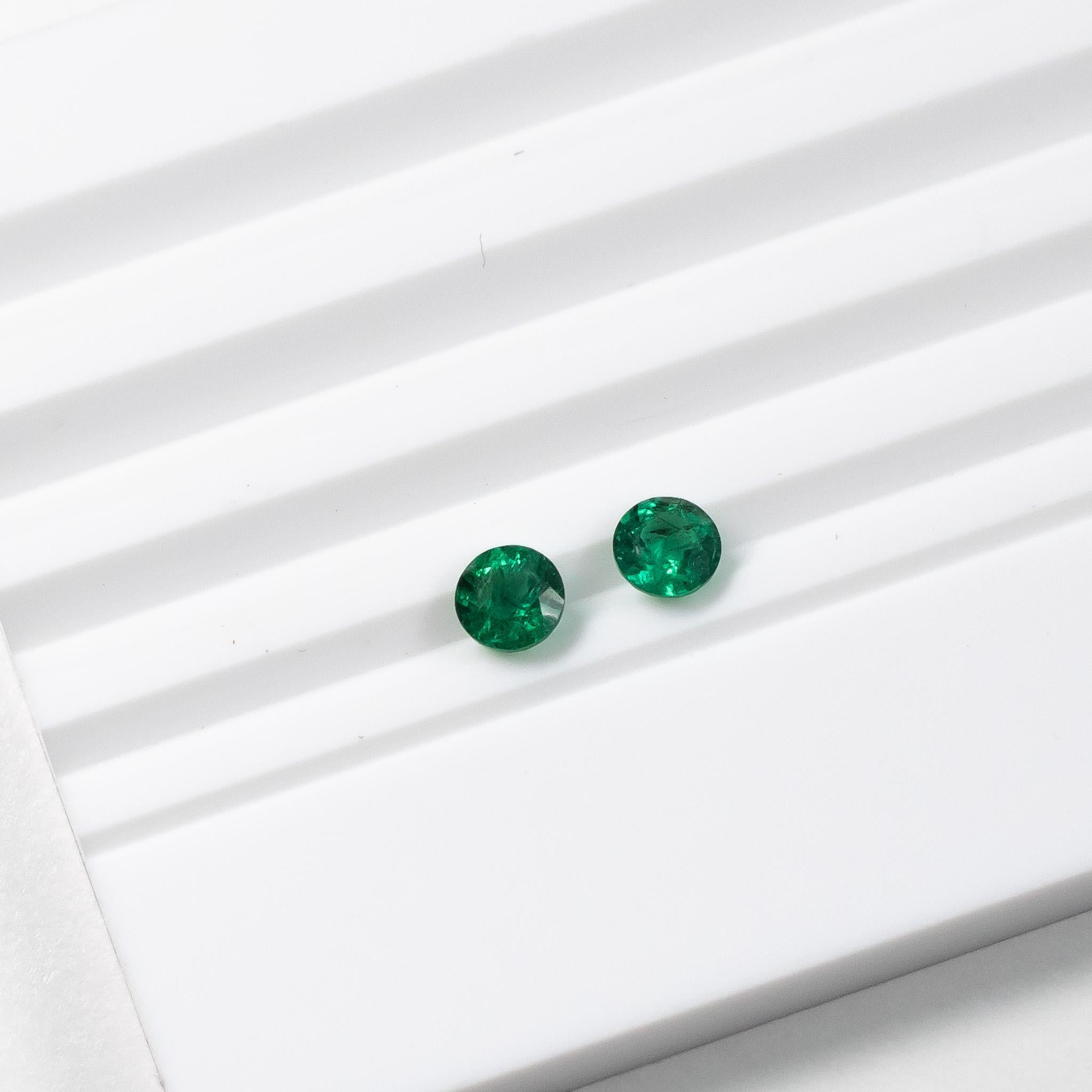 Round Cut Round Green Emerald Studs in Platinum