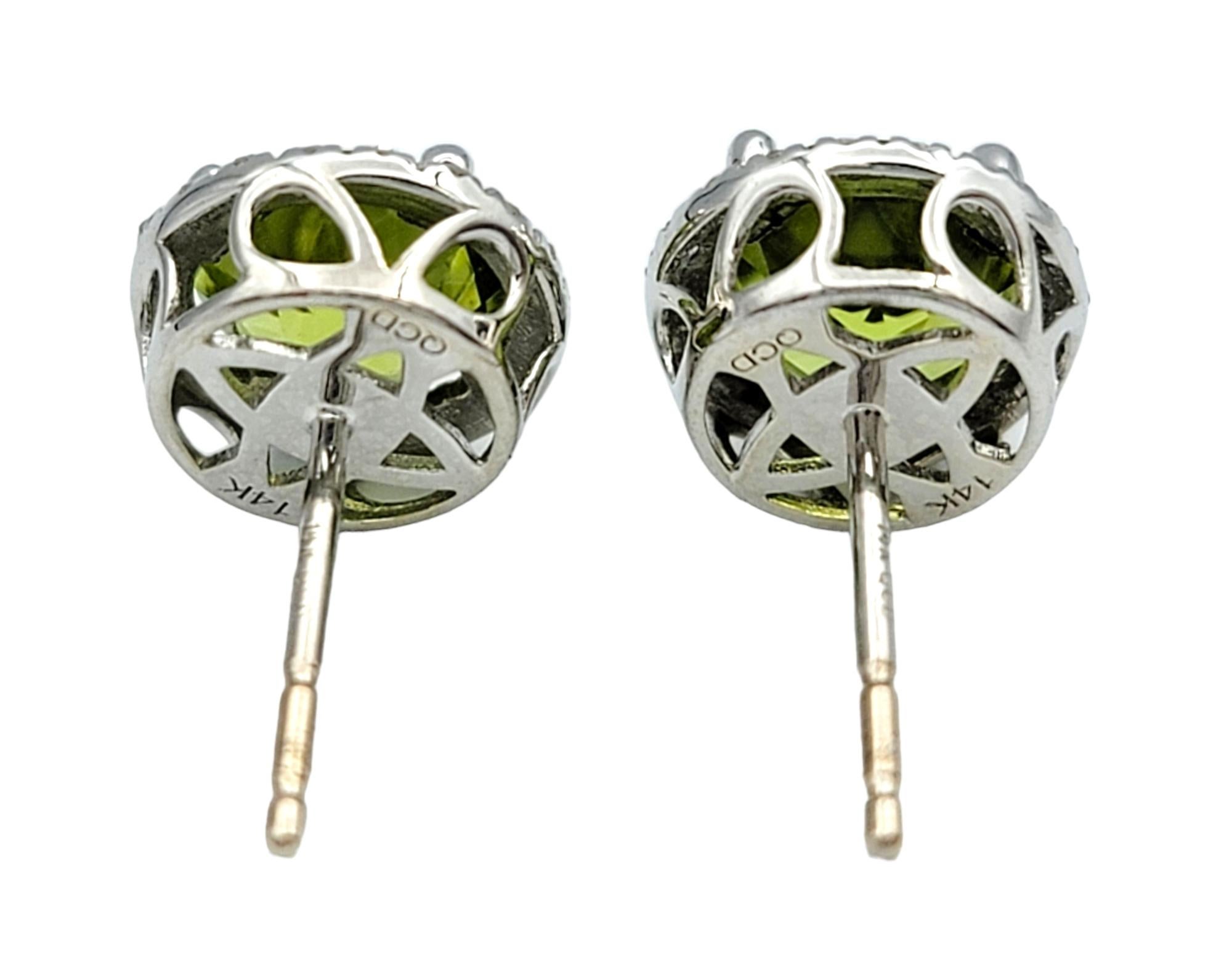 Round Green Peridot and Diamond Halo Stud Earrings Set in 14 Karat White Gold In Excellent Condition For Sale In Scottsdale, AZ