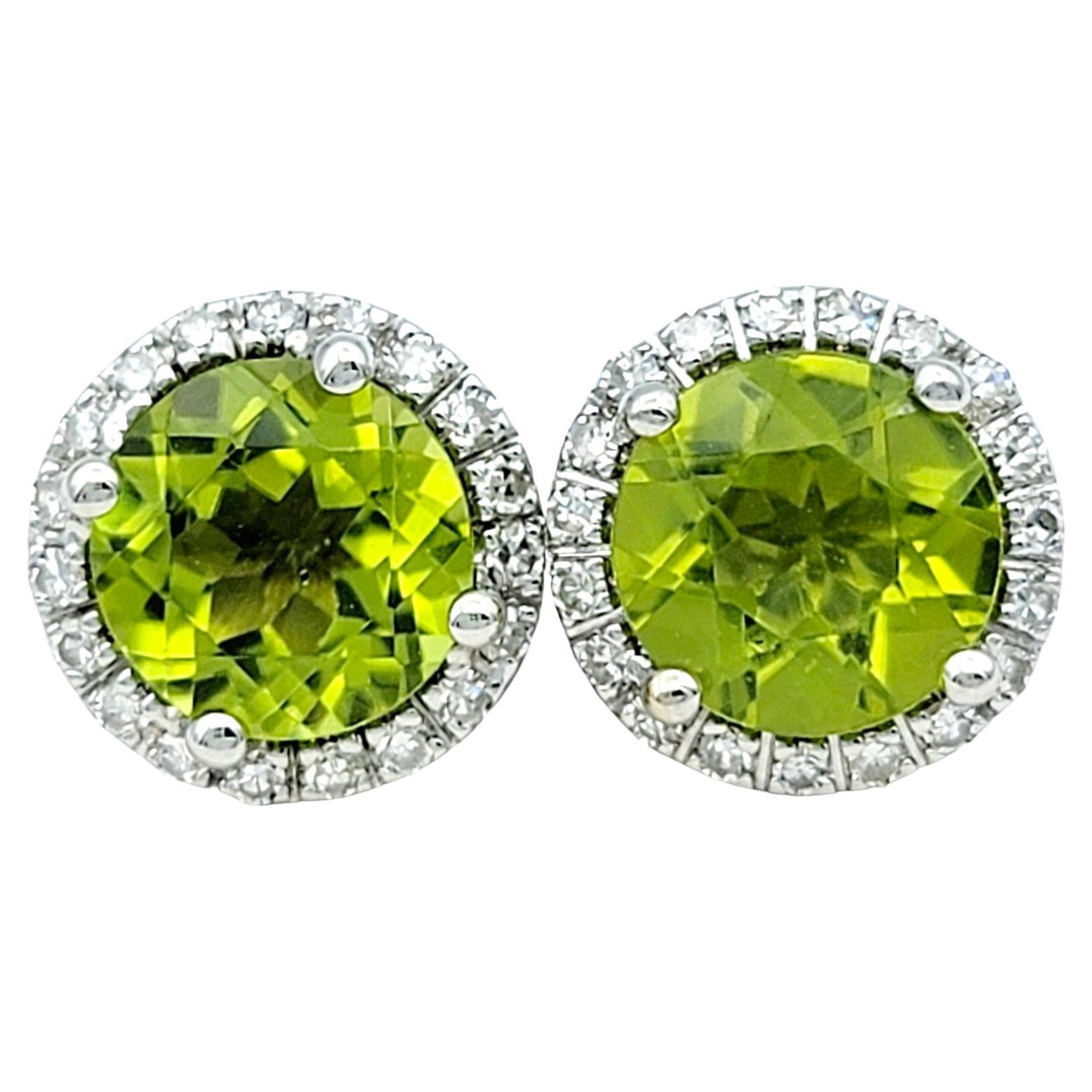 Round Green Peridot and Diamond Halo Stud Earrings Set in 14 Karat White Gold For Sale