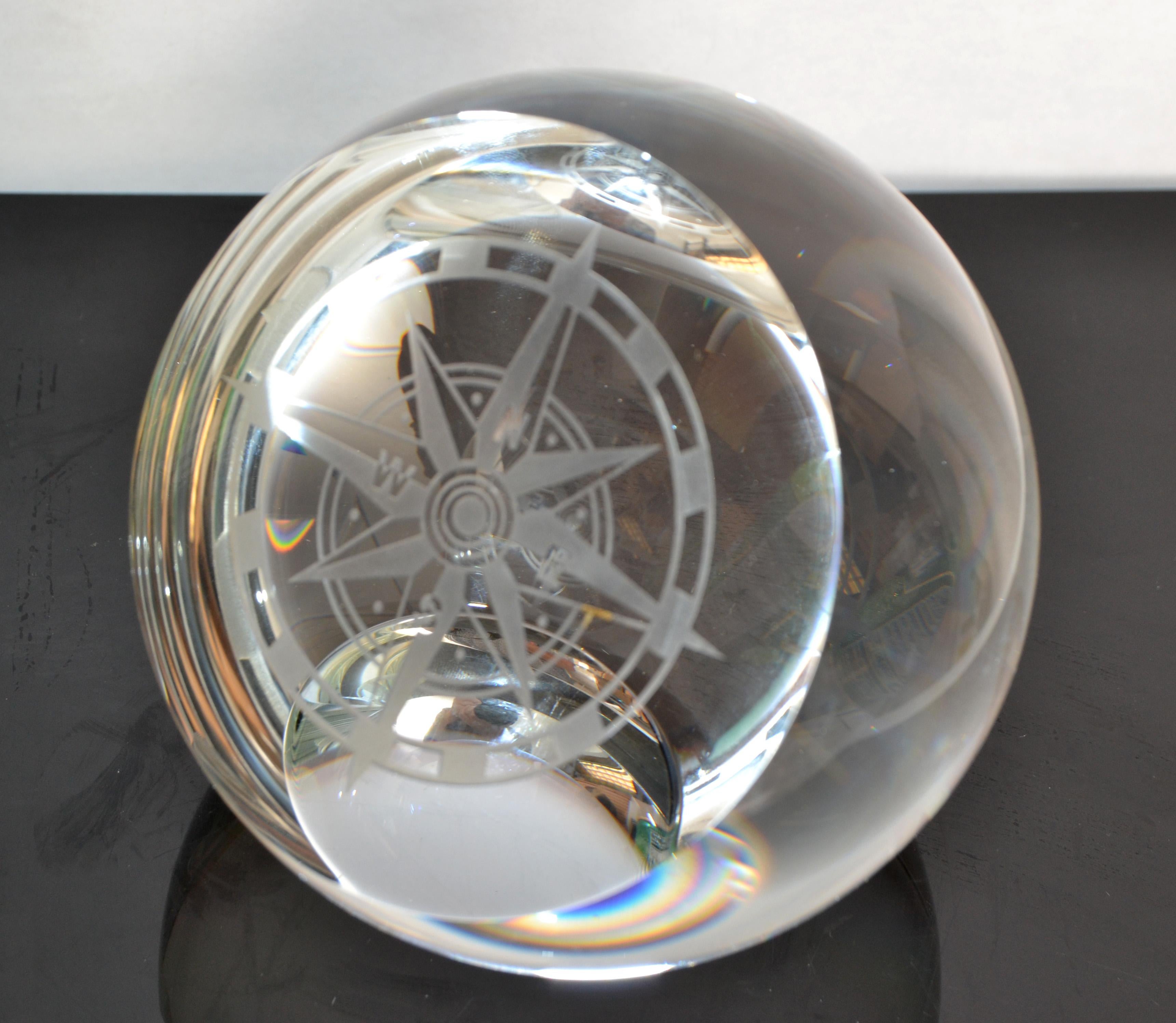 Murano heavy transparent glass Paperweight with etched Compass rose and geometric base.
It also serves as a magnifying glass for small areas. 
In very good vintage condition. 
 