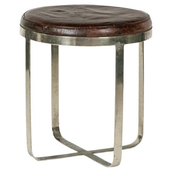Tabouret rond de style industriel, en métal et cuir. 1970s