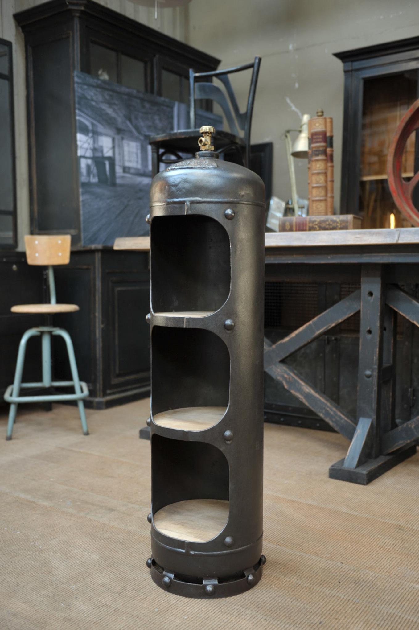 French iron and brass Gaz bottle in polished iron with 5 solid oak round shelves, circa 1960.