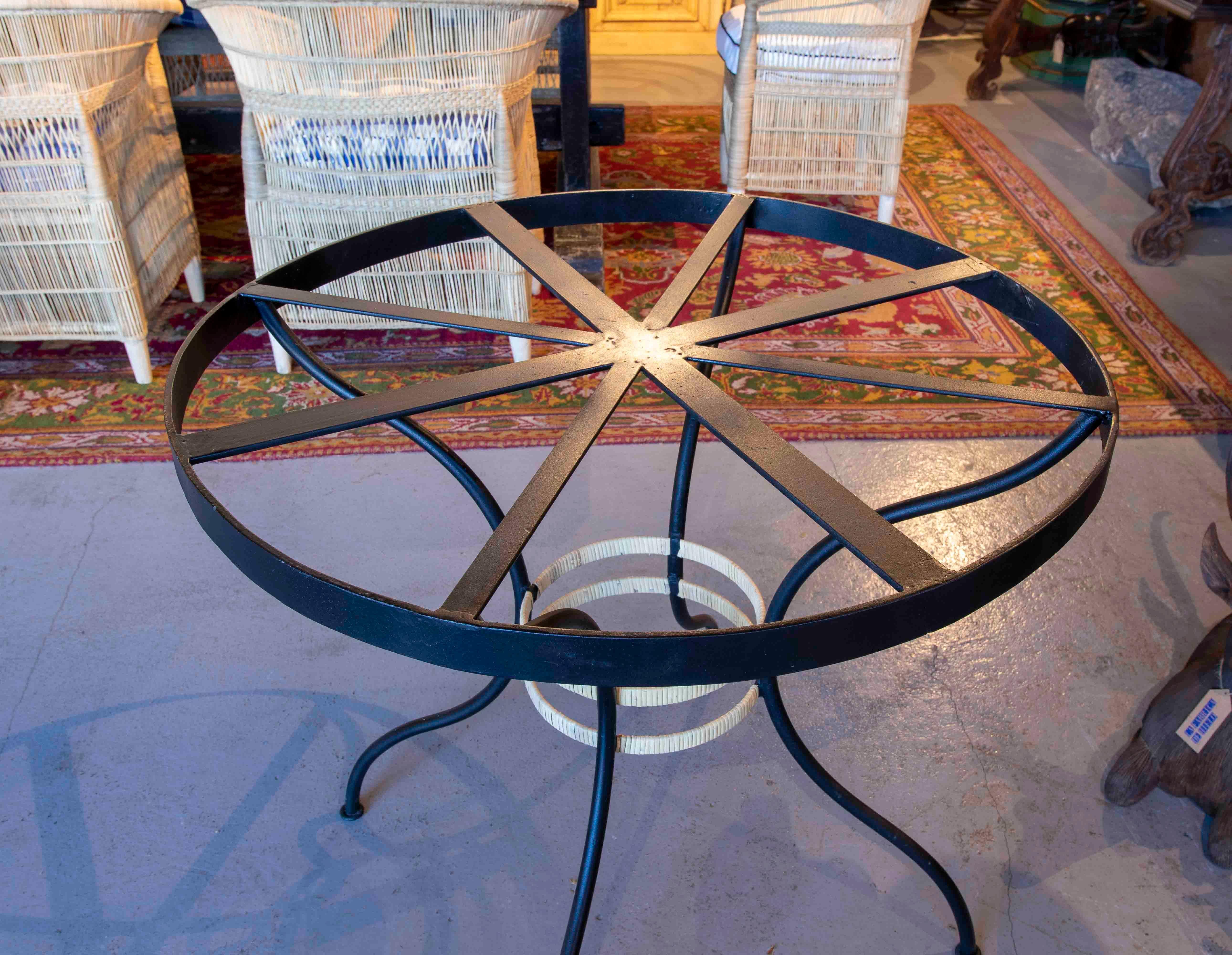 Spanish Round Iron Table with Wicker Decoration on the Base For Sale