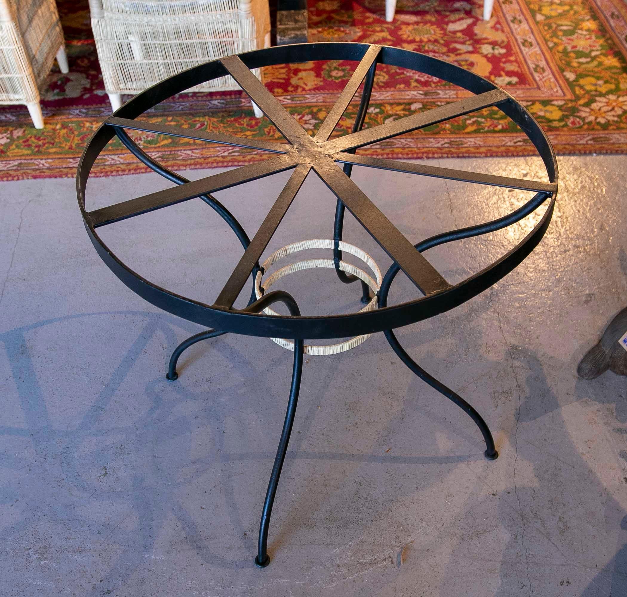 Contemporary Round Iron Table with Wicker Decoration on the Base For Sale