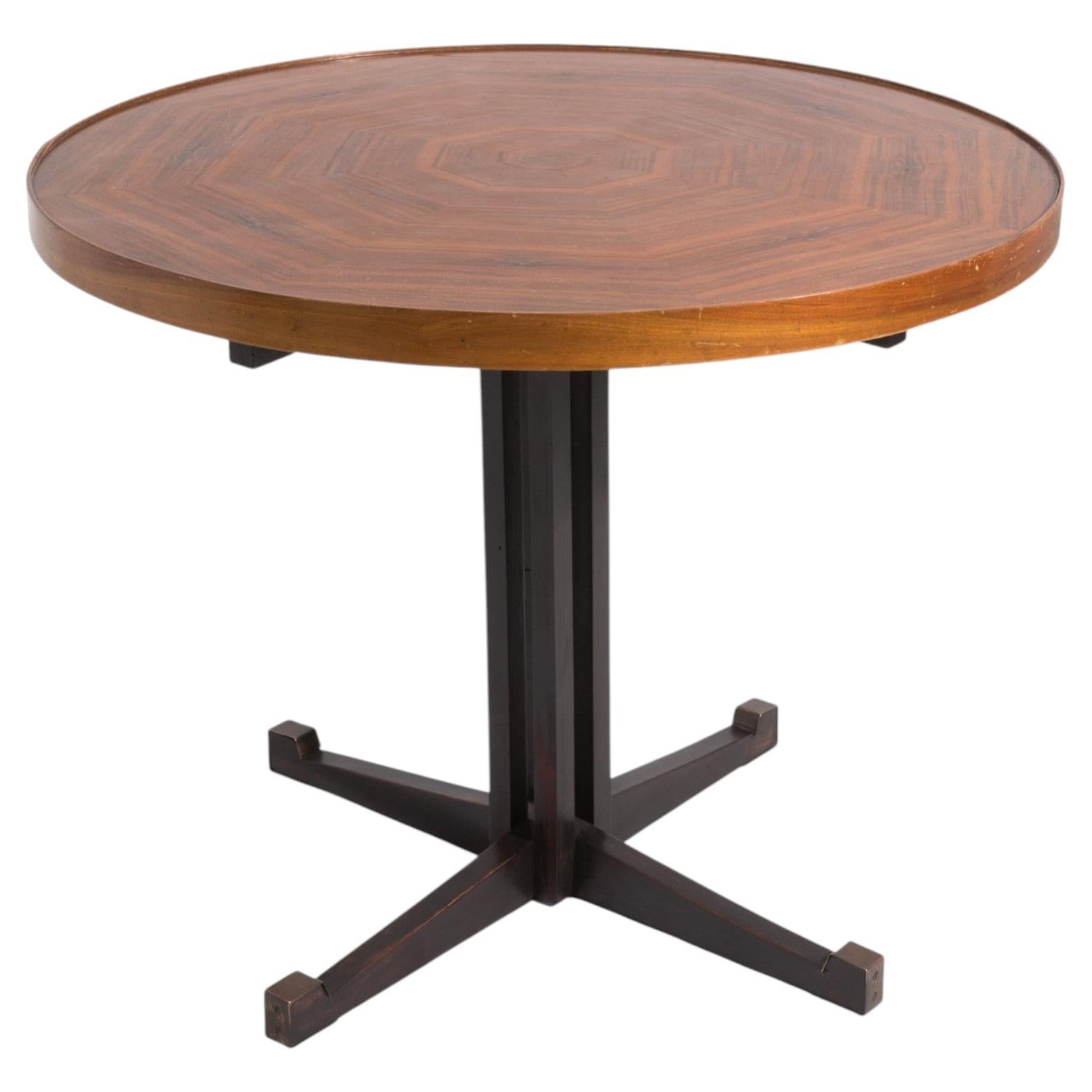 Round Italian dining table by Vittorio Gregotti with brass legs