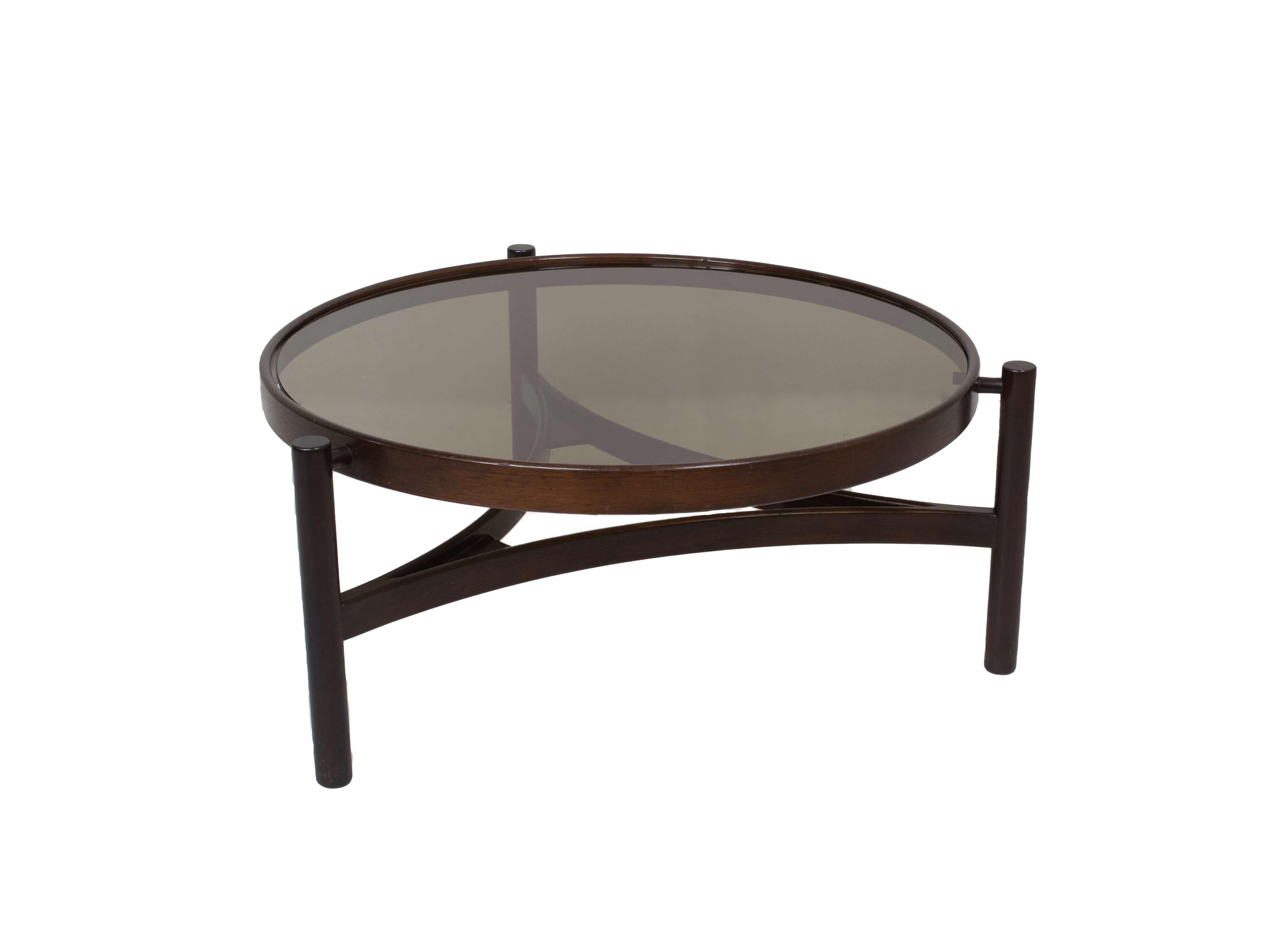Round Italian modern coffee table by Gianfranco Frattini for Cassina from the 1960s. This beautiful Italian vintage design table, with model 775, has an exceptional design. It is made of walnut stained beech bentwood and has the original smoked
