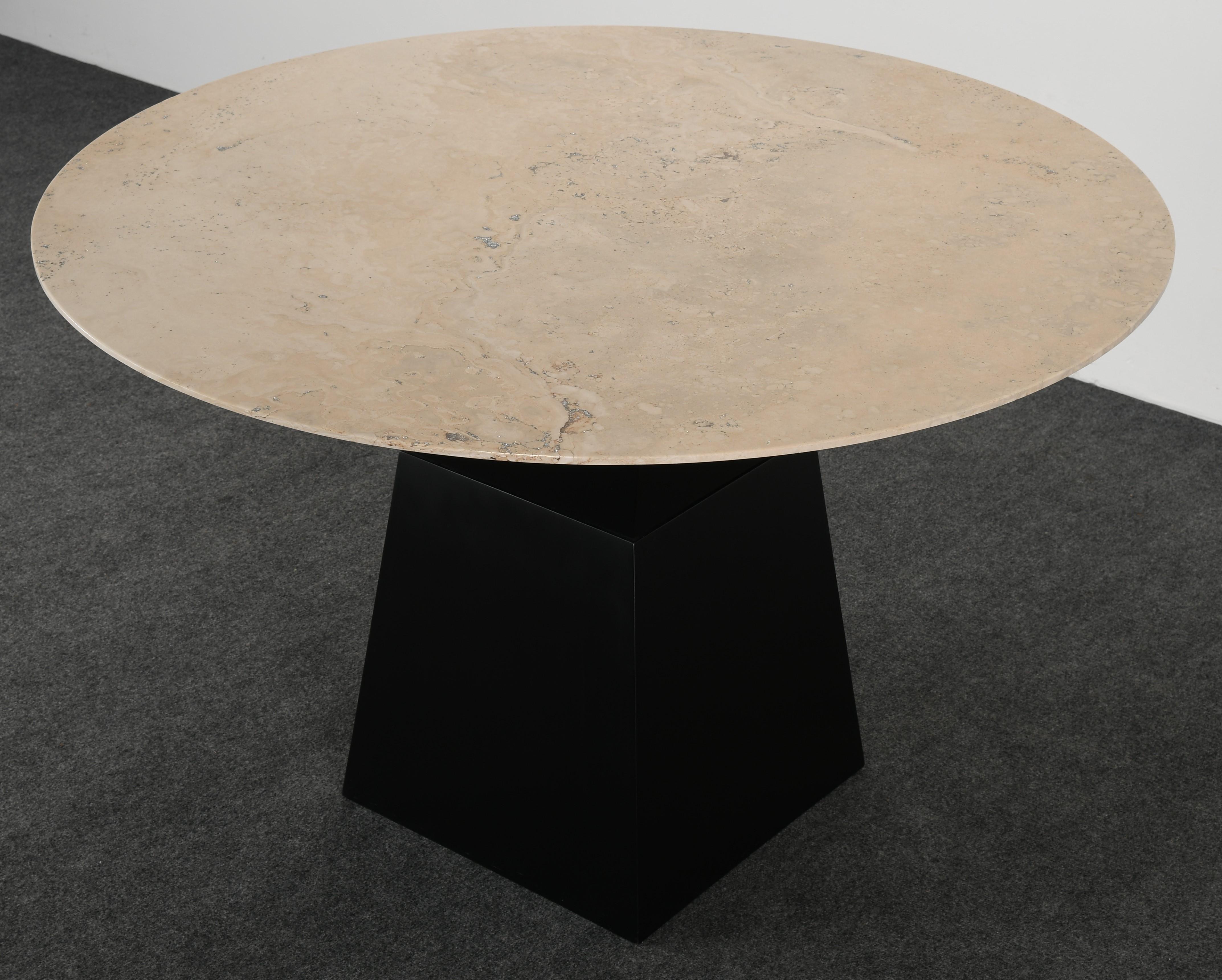 Italian stone round table with silver metallic Tivoli dust inlay on a rectangular wenge base, 2000s. Beautiful top and surface on a simple base for a Minimalist interior. The table is made by Stone International. The top has veining and open pores